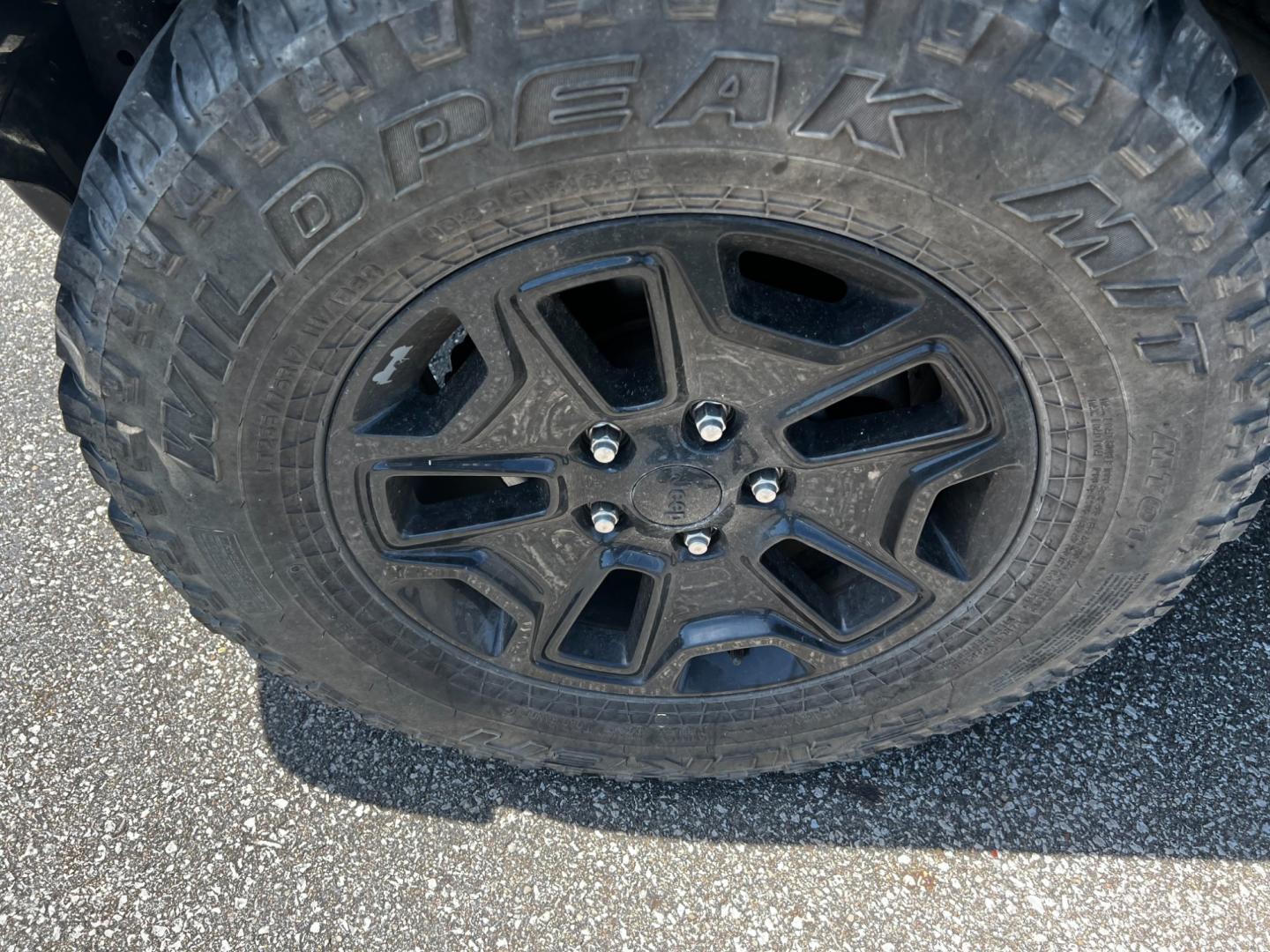2015 Black /Black Jeep Wrangler Unlimited Willys 4WD (1C4BJWDG9FL) with an 3.6L V6 DOHC 24V engine, 6 Speed Manual transmission, located at 11115 Chardon Rd. , Chardon, OH, 44024, (440) 214-9705, 41.580246, -81.241943 - This 2015 Jeep Wrangler Unlimited Willy Wheeler Edition is a capable and well-equipped off-road vehicle. It features a 3.6-liter Pentastar V6 engine paired with a 6-speed manual transmission, offering a traditional driving experience favored by many off-road enthusiasts. The vehicle comes with sever - Photo#13