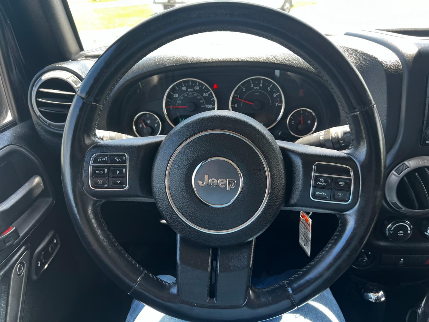 2015 Black /Black Jeep Wrangler Unlimited Willys 4WD (1C4BJWDG9FL) with an 3.6L V6 DOHC 24V engine, 6 Speed Manual transmission, located at 11115 Chardon Rd. , Chardon, OH, 44024, (440) 214-9705, 41.580246, -81.241943 - This 2015 Jeep Wrangler Unlimited Willy Wheeler Edition is a capable and well-equipped off-road vehicle. It features a 3.6-liter Pentastar V6 engine paired with a 6-speed manual transmission, offering a traditional driving experience favored by many off-road enthusiasts. The vehicle comes with sever - Photo#21