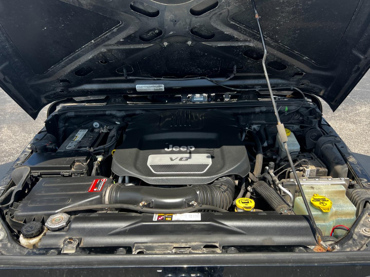2015 Black /Black Jeep Wrangler Unlimited Willys 4WD (1C4BJWDG9FL) with an 3.6L V6 DOHC 24V engine, 6 Speed Manual transmission, located at 11115 Chardon Rd. , Chardon, OH, 44024, (440) 214-9705, 41.580246, -81.241943 - This 2015 Jeep Wrangler Unlimited Willy Wheeler Edition is a capable and well-equipped off-road vehicle. It features a 3.6-liter Pentastar V6 engine paired with a 6-speed manual transmission, offering a traditional driving experience favored by many off-road enthusiasts. The vehicle comes with sever - Photo#14