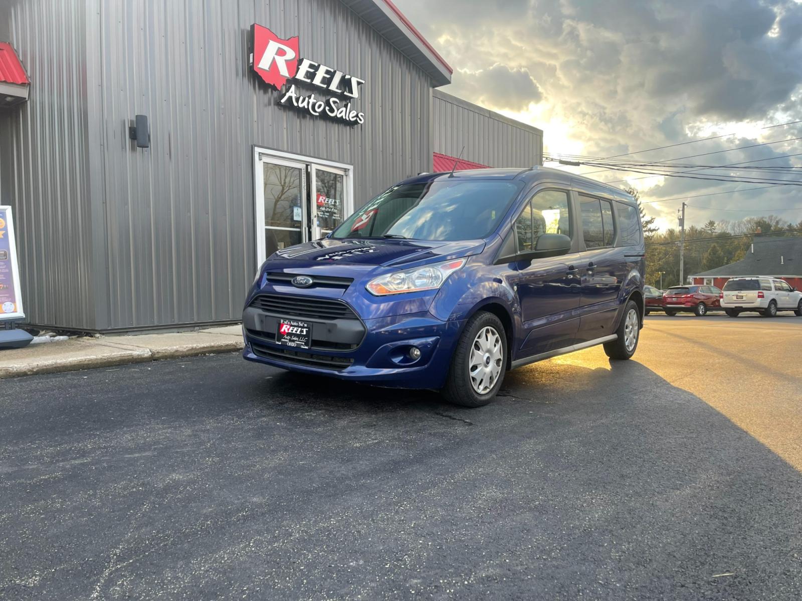 2017 Blue /Black Ford Transit Connect Wagon XLT w/Rear Liftgate LWB (NM0GE9F78H1) with an 2.5L I4 DOHC 16V engine, 6A transmission, located at 547 E. Main St., Orwell, OH, 44076, (440) 437-5893, 41.535435, -80.847855 - Photo #0