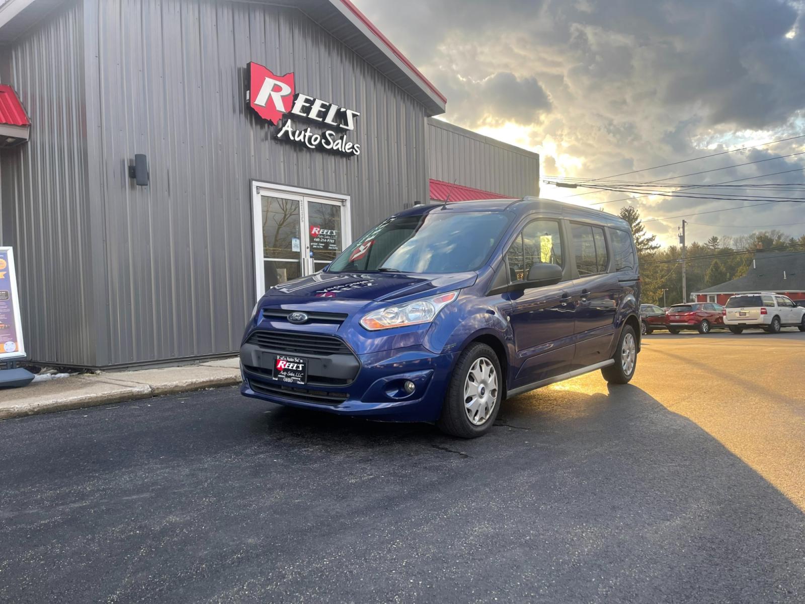 2017 Blue /Black Ford Transit Connect Wagon XLT w/Rear Liftgate LWB (NM0GE9F78H1) with an 2.5L I4 DOHC 16V engine, 6A transmission, located at 547 E. Main St., Orwell, OH, 44076, (440) 437-5893, 41.535435, -80.847855 - Photo #1