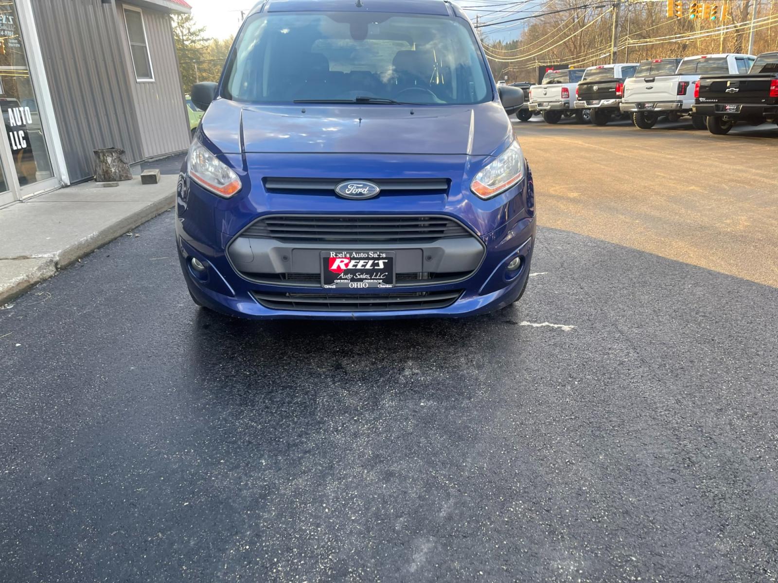 2017 Blue /Black Ford Transit Connect Wagon XLT w/Rear Liftgate LWB (NM0GE9F78H1) with an 2.5L I4 DOHC 16V engine, 6A transmission, located at 547 E. Main St., Orwell, OH, 44076, (440) 437-5893, 41.535435, -80.847855 - Photo #2