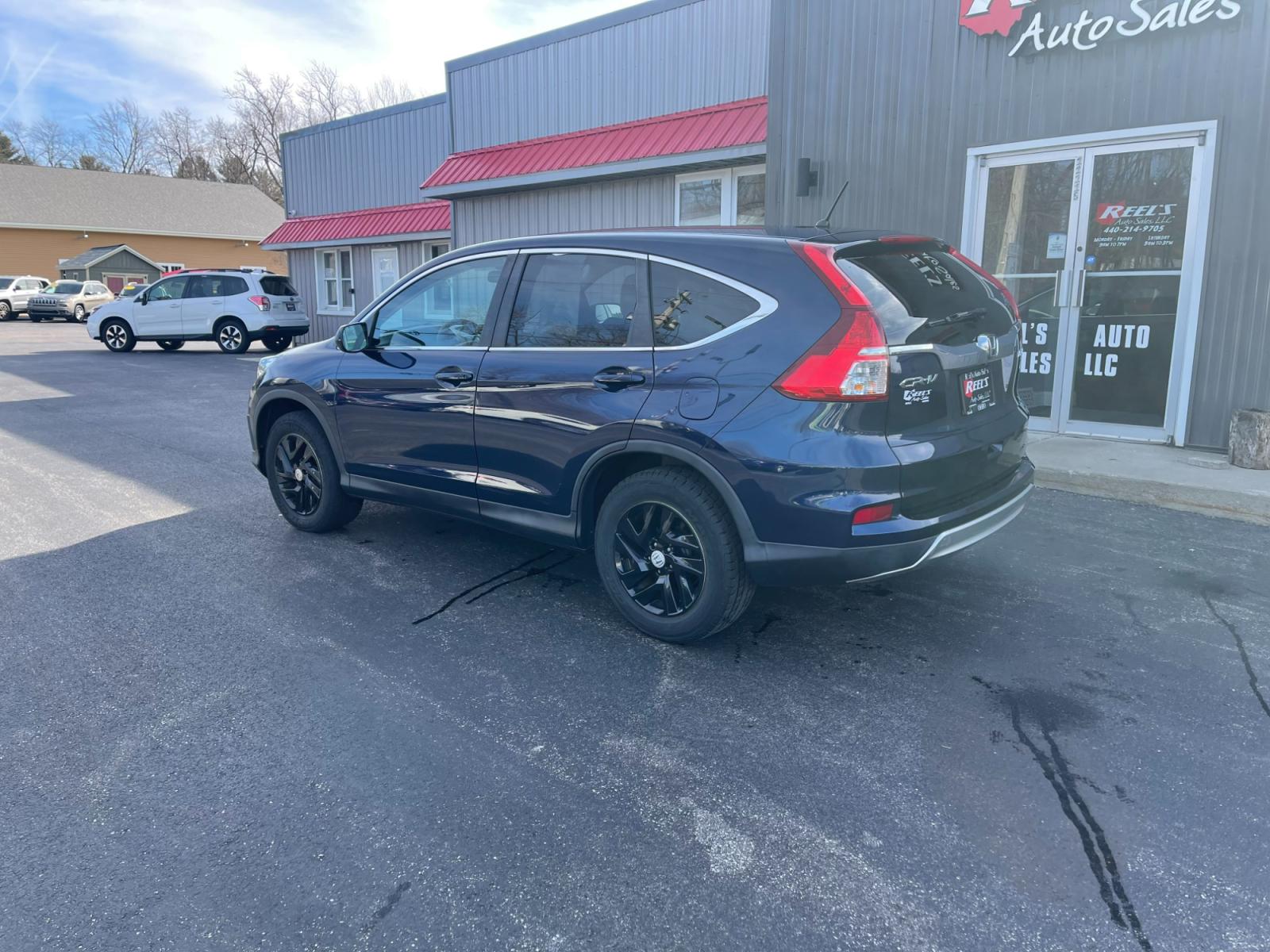 2015 Blue /Black Honda CR-V EX 4WD (2HKRM4H57FH) with an 2.4L I4 DOHC 16V engine, Automatic transmission, located at 547 E. Main St., Orwell, OH, 44076, (440) 437-5893, 41.535435, -80.847855 - 2015 Honda CR-V ---- All Wheel Drive ---- 28 MPG Combined ---- Heated Seats ---- Moon Roof ---- Fully Serviced and Recently Detailed ---- Reel's Auto Sales is located in both Chardon and Orwell Ohio. Financing available and trades welcome. Please call or text to confirm location, set an appointment - Photo #10