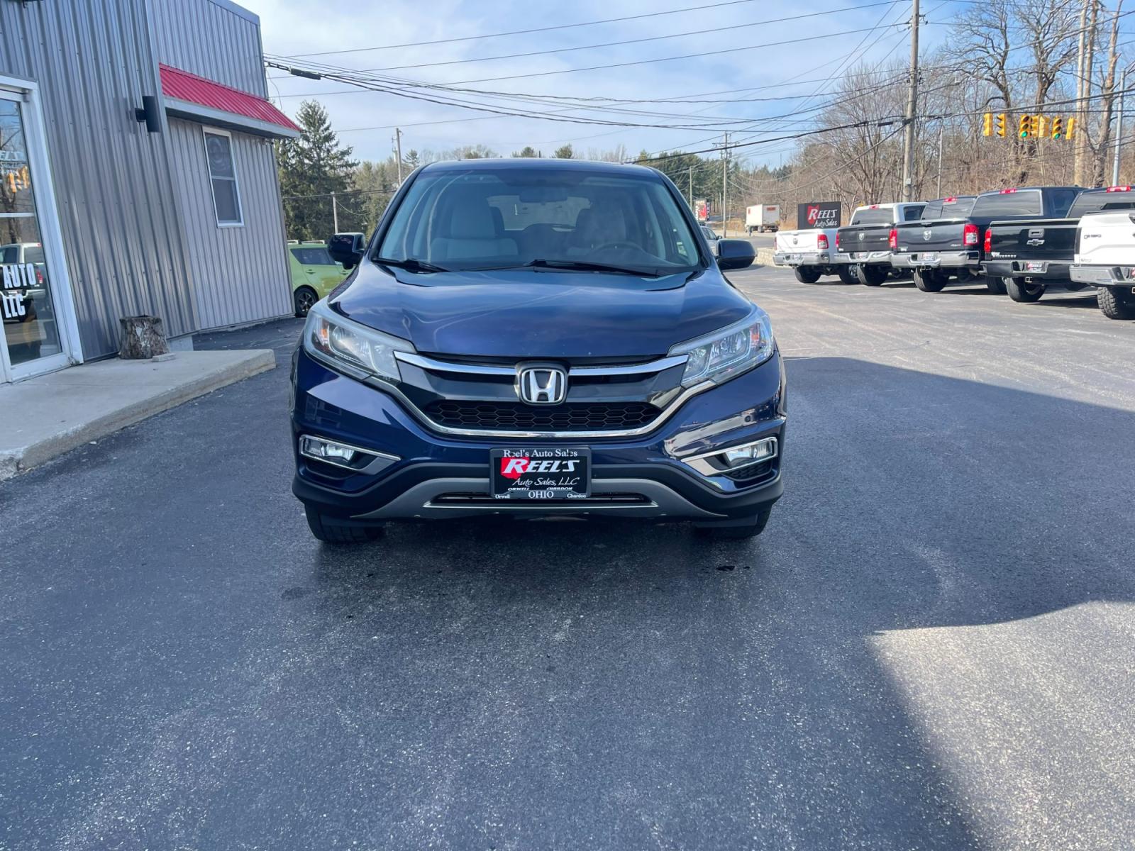 2015 Blue /Black Honda CR-V EX 4WD (2HKRM4H57FH) with an 2.4L I4 DOHC 16V engine, Automatic transmission, located at 547 E. Main St., Orwell, OH, 44076, (440) 437-5893, 41.535435, -80.847855 - 2015 Honda CR-V ---- All Wheel Drive ---- 28 MPG Combined ---- Heated Seats ---- Moon Roof ---- Fully Serviced and Recently Detailed ---- Reel's Auto Sales is located in both Chardon and Orwell Ohio. Financing available and trades welcome. Please call or text to confirm location, set an appointment - Photo #1