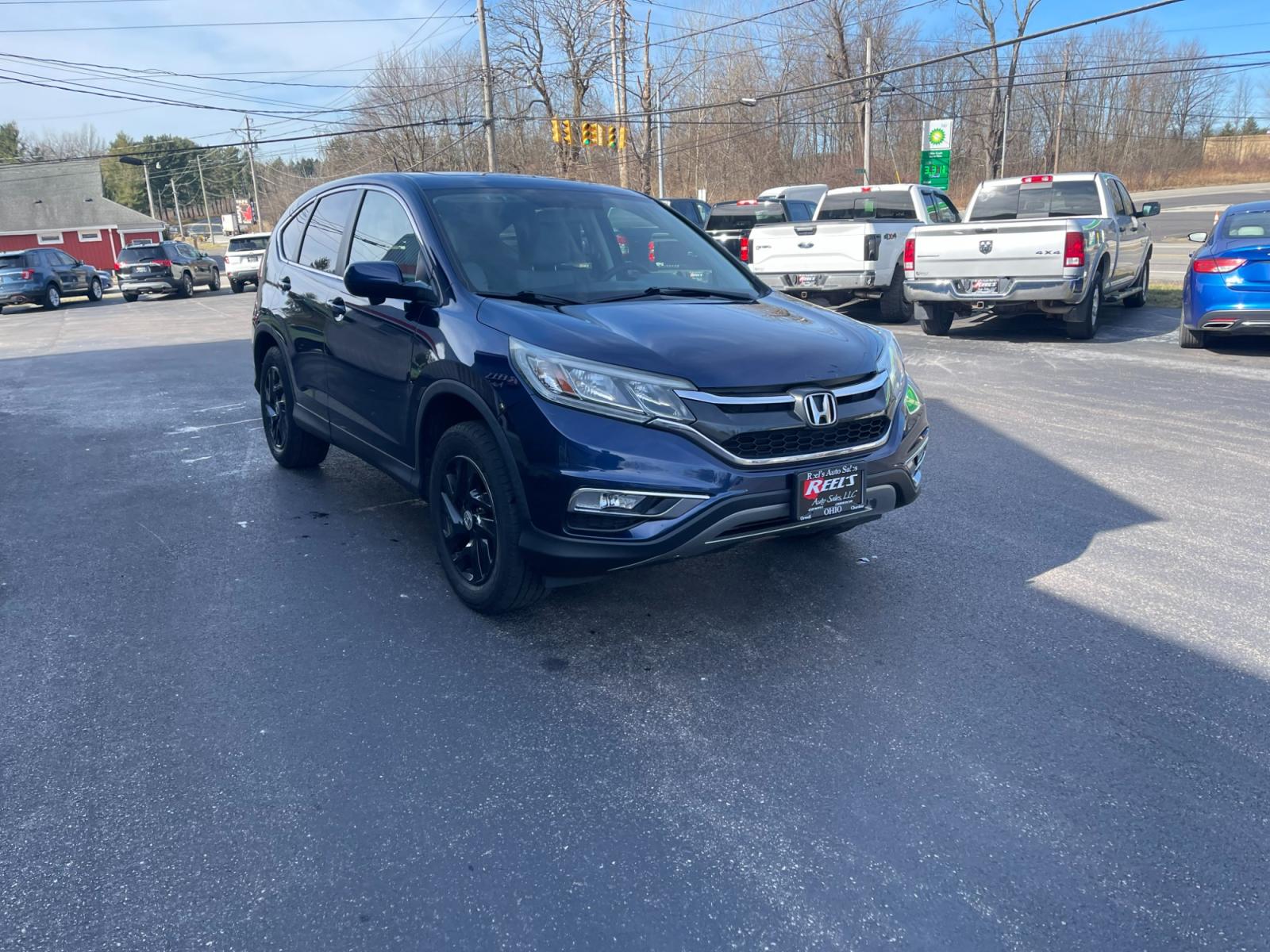 2015 Blue /Black Honda CR-V EX 4WD (2HKRM4H57FH) with an 2.4L I4 DOHC 16V engine, Automatic transmission, located at 547 E. Main St., Orwell, OH, 44076, (440) 437-5893, 41.535435, -80.847855 - 2015 Honda CR-V ---- All Wheel Drive ---- 28 MPG Combined ---- Heated Seats ---- Moon Roof ---- Fully Serviced and Recently Detailed ---- Reel's Auto Sales is located in both Chardon and Orwell Ohio. Financing available and trades welcome. Please call or text to confirm location, set an appointment - Photo #2