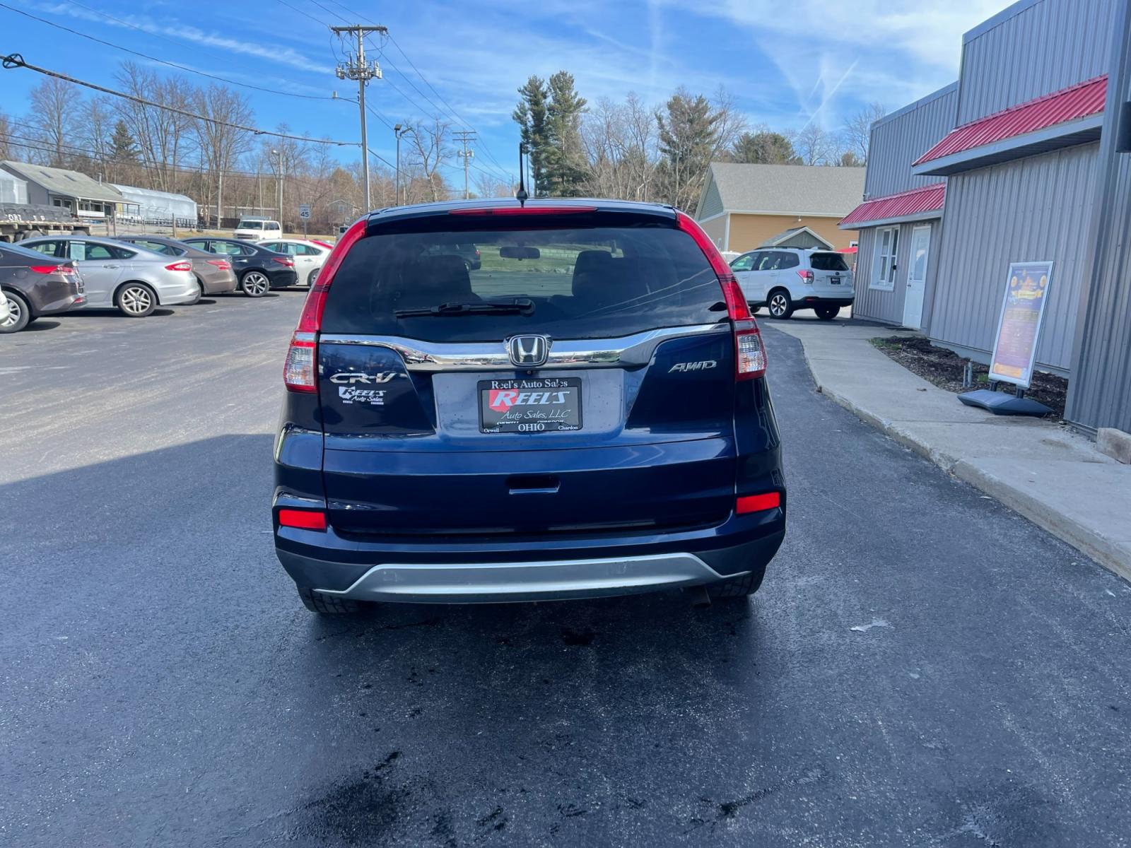 2015 Blue /Black Honda CR-V EX 4WD (2HKRM4H57FH) with an 2.4L I4 DOHC 16V engine, Automatic transmission, located at 547 E. Main St., Orwell, OH, 44076, (440) 437-5893, 41.535435, -80.847855 - 2015 Honda CR-V ---- All Wheel Drive ---- 28 MPG Combined ---- Heated Seats ---- Moon Roof ---- Fully Serviced and Recently Detailed ---- Reel's Auto Sales is located in both Chardon and Orwell Ohio. Financing available and trades welcome. Please call or text to confirm location, set an appointment - Photo #8