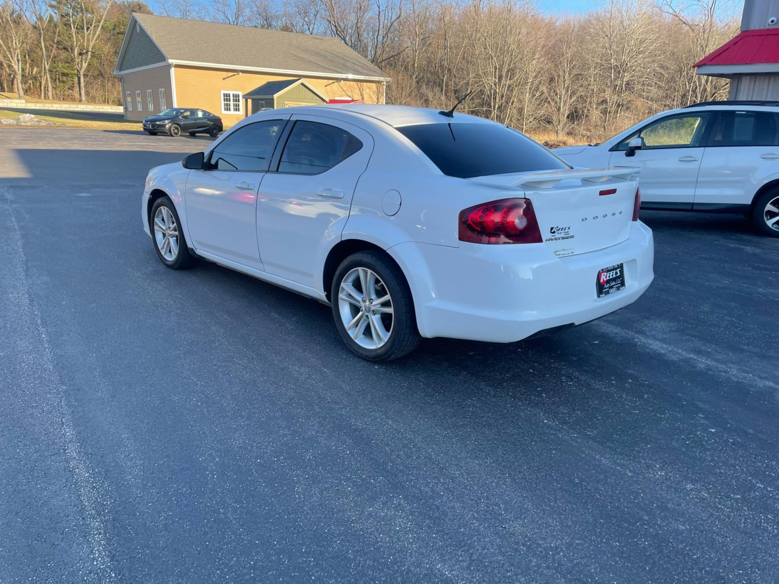 2014 White /Black Dodge Avenger Rallye (1C3CDZAB0EN) with an 2.4L I4 DOHC 16V engine, 4-Speed Automatic transmission, located at 547 E. Main St., Orwell, OH, 44076, (440) 437-5893, 41.535435, -80.847855 - Photo #10