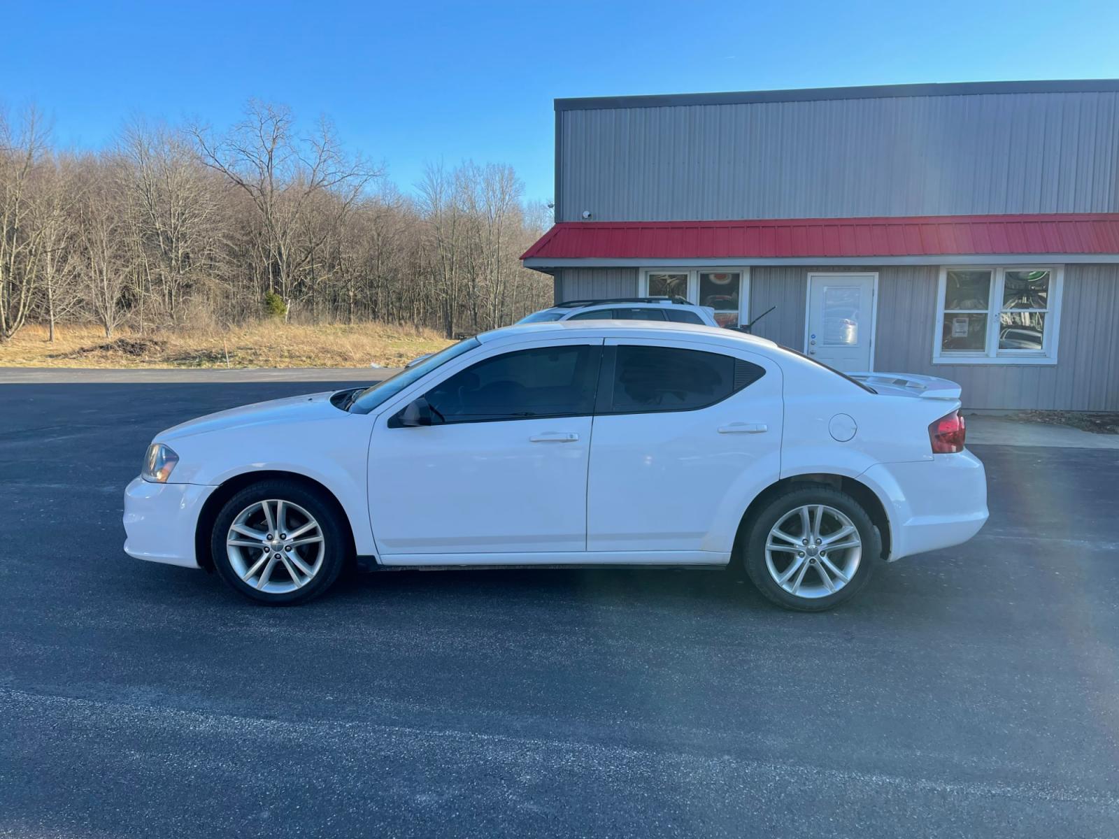 2014 White /Black Dodge Avenger Rallye (1C3CDZAB0EN) with an 2.4L I4 DOHC 16V engine, 4-Speed Automatic transmission, located at 547 E. Main St., Orwell, OH, 44076, (440) 437-5893, 41.535435, -80.847855 - Photo #12