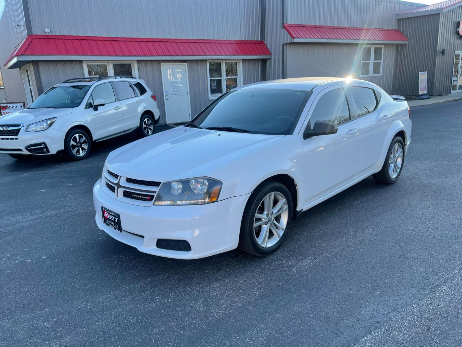 2014 White /Black Dodge Avenger Rallye (1C3CDZAB0EN) with an 2.4L I4 DOHC 16V engine, 4-Speed Automatic transmission, located at 547 E. Main St., Orwell, OH, 44076, (440) 437-5893, 41.535435, -80.847855 - Photo #14