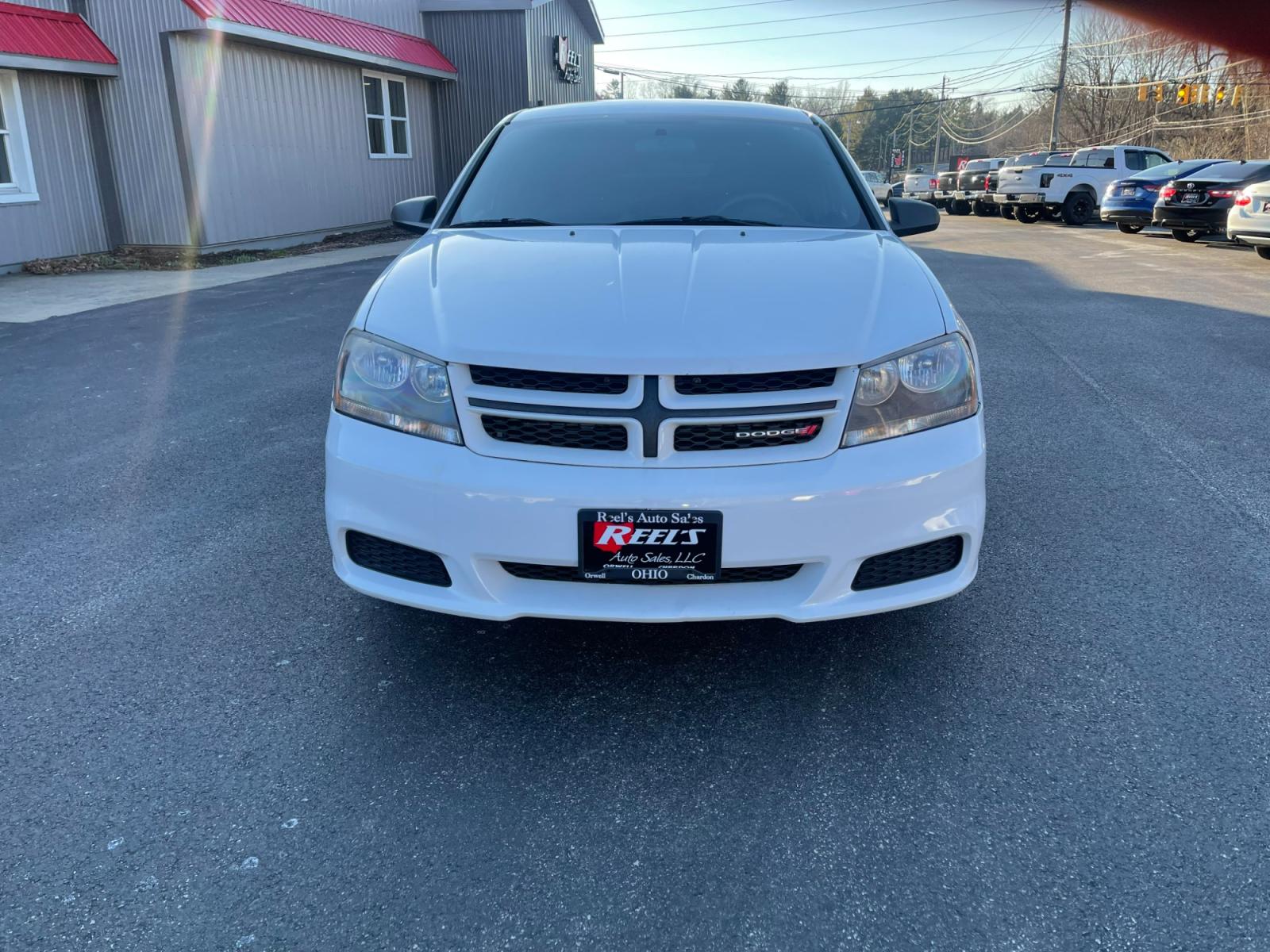 2014 White /Black Dodge Avenger Rallye (1C3CDZAB0EN) with an 2.4L I4 DOHC 16V engine, 4-Speed Automatic transmission, located at 547 E. Main St., Orwell, OH, 44076, (440) 437-5893, 41.535435, -80.847855 - Photo #1