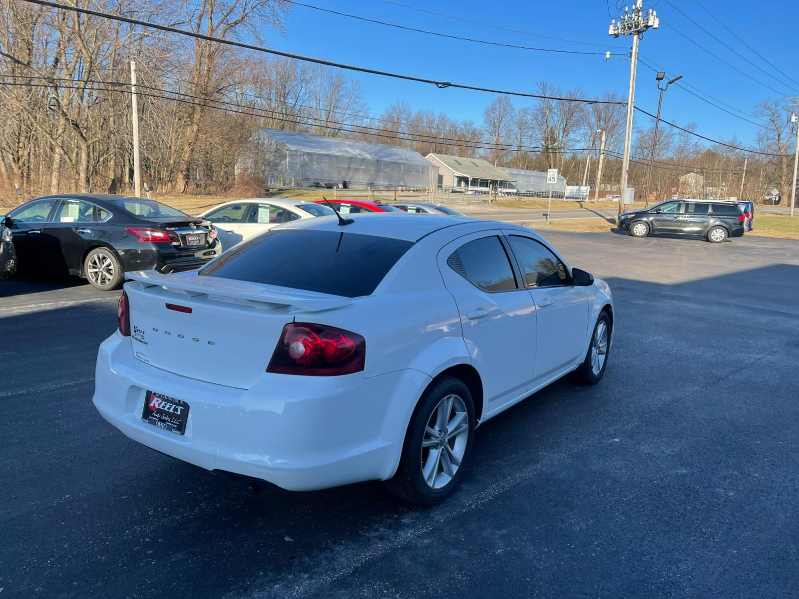 2014 White /Black Dodge Avenger Rallye (1C3CDZAB0EN) with an 2.4L I4 DOHC 16V engine, 4-Speed Automatic transmission, located at 547 E. Main St., Orwell, OH, 44076, (440) 437-5893, 41.535435, -80.847855 - Photo #7