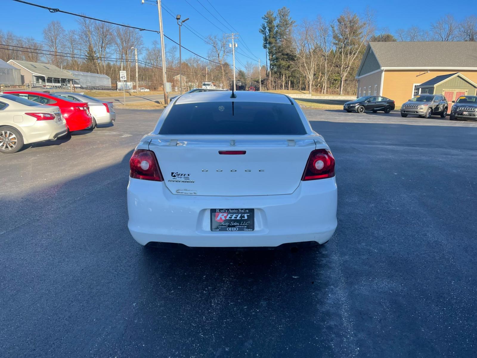 2014 White /Black Dodge Avenger Rallye (1C3CDZAB0EN) with an 2.4L I4 DOHC 16V engine, 4-Speed Automatic transmission, located at 547 E. Main St., Orwell, OH, 44076, (440) 437-5893, 41.535435, -80.847855 - Photo #8