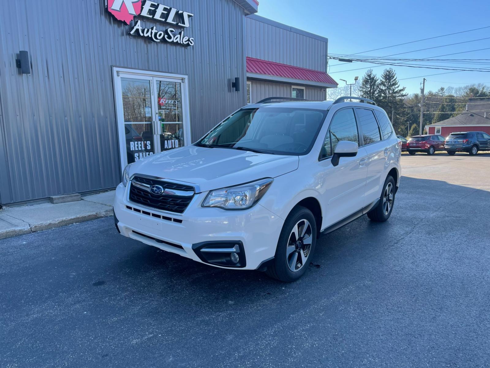 2018 White /Gray Subaru Forester 2.5i Premium PZEV CVT (JF2SJAGC0JH) with an 2.5L H4 SOHC 16V engine, Automatic transmission, located at 11115 Chardon Rd. , Chardon, OH, 44024, (440) 214-9705, 41.580246, -81.241943 - 2018 Subaru Forester ---- One Owner Carfax ---- 86K Miles ---- All Wheel Drive ----- 28 MPG Combined ---- Panoramic Moon Roof ---- Fully Serviced and Recently Detailed ---- Reel's Auto Sales is located in both Chardon and Orwell Ohio. Financing available and trades welcome. Please call or text to co - Photo #0
