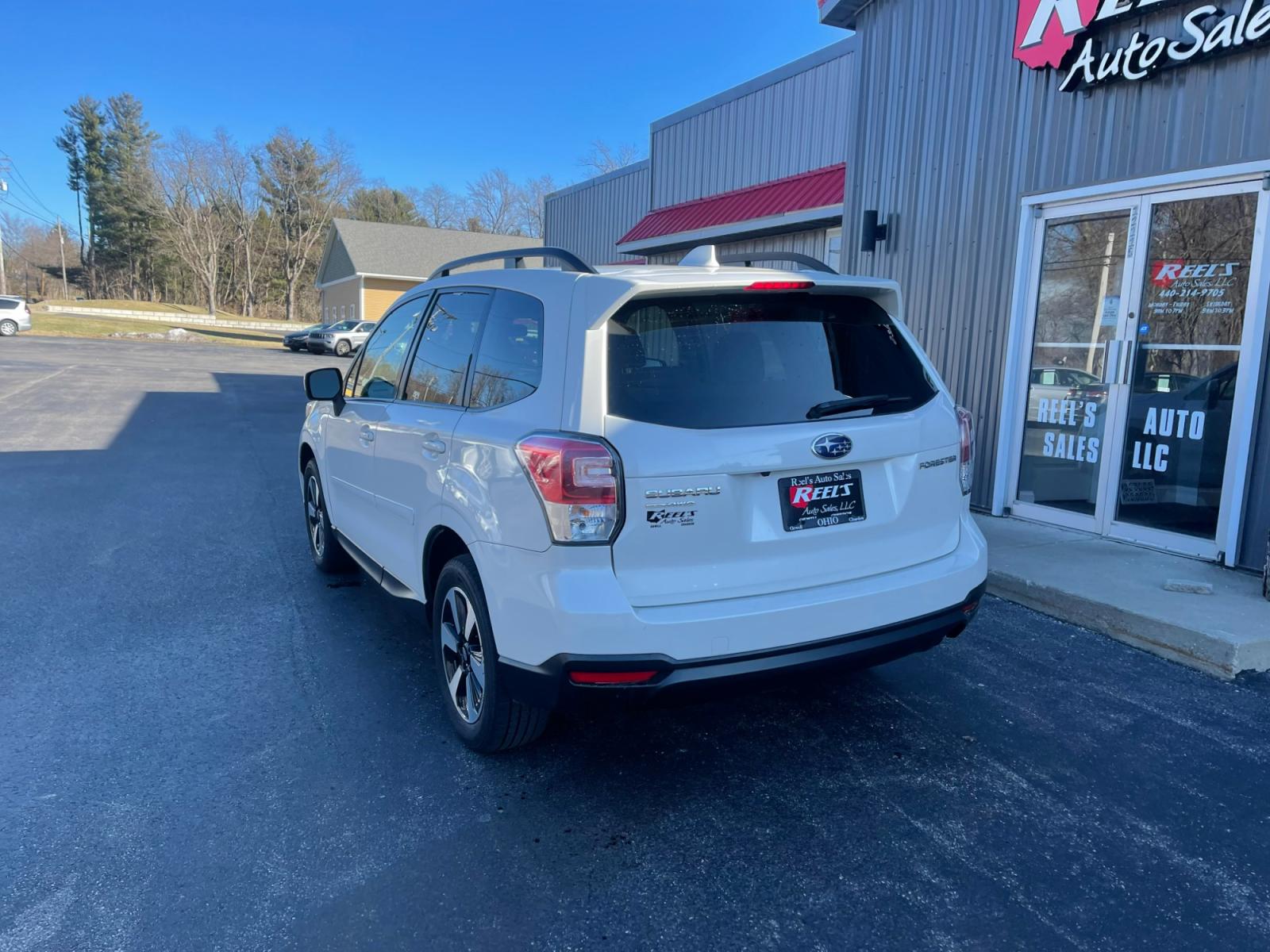 2018 White /Gray Subaru Forester 2.5i Premium PZEV CVT (JF2SJAGC0JH) with an 2.5L H4 SOHC 16V engine, Automatic transmission, located at 11115 Chardon Rd. , Chardon, OH, 44024, (440) 214-9705, 41.580246, -81.241943 - 2018 Subaru Forester ---- One Owner Carfax ---- 86K Miles ---- All Wheel Drive ----- 28 MPG Combined ---- Panoramic Moon Roof ---- Fully Serviced and Recently Detailed ---- Reel's Auto Sales is located in both Chardon and Orwell Ohio. Financing available and trades welcome. Please call or text to co - Photo #9