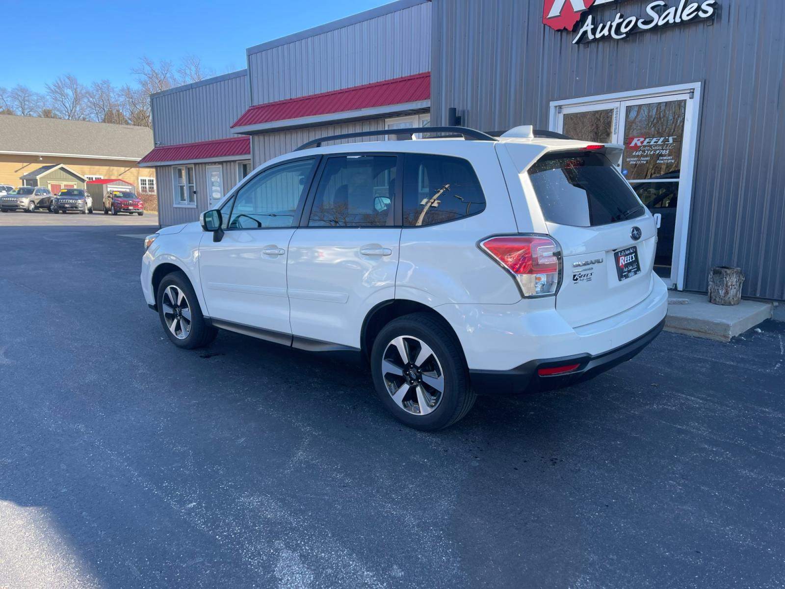 2018 White /Gray Subaru Forester 2.5i Premium PZEV CVT (JF2SJAGC0JH) with an 2.5L H4 SOHC 16V engine, Automatic transmission, located at 11115 Chardon Rd. , Chardon, OH, 44024, (440) 214-9705, 41.580246, -81.241943 - 2018 Subaru Forester ---- One Owner Carfax ---- 86K Miles ---- All Wheel Drive ----- 28 MPG Combined ---- Panoramic Moon Roof ---- Fully Serviced and Recently Detailed ---- Reel's Auto Sales is located in both Chardon and Orwell Ohio. Financing available and trades welcome. Please call or text to co - Photo #10