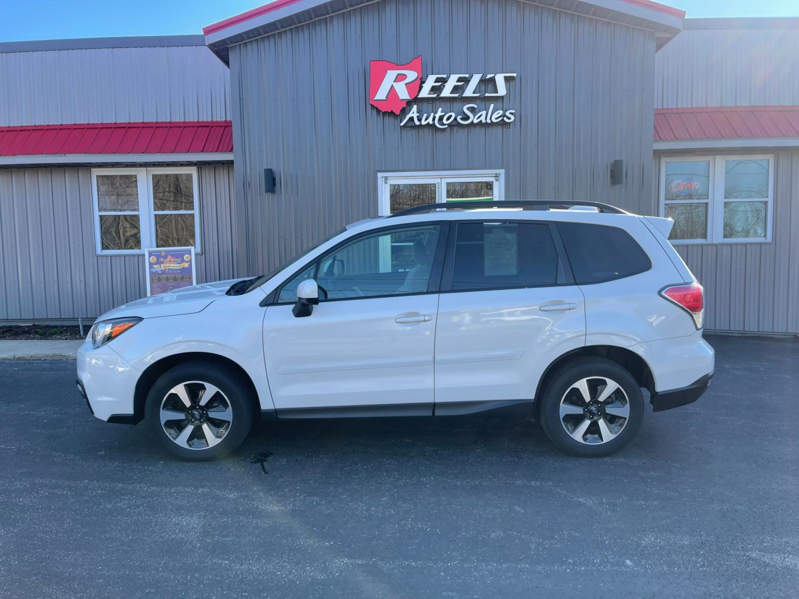 2018 White /Gray Subaru Forester 2.5i Premium PZEV CVT (JF2SJAGC0JH) with an 2.5L H4 SOHC 16V engine, Automatic transmission, located at 11115 Chardon Rd. , Chardon, OH, 44024, (440) 214-9705, 41.580246, -81.241943 - 2018 Subaru Forester ---- One Owner Carfax ---- 86K Miles ---- All Wheel Drive ----- 28 MPG Combined ---- Panoramic Moon Roof ---- Fully Serviced and Recently Detailed ---- Reel's Auto Sales is located in both Chardon and Orwell Ohio. Financing available and trades welcome. Please call or text to co - Photo #12