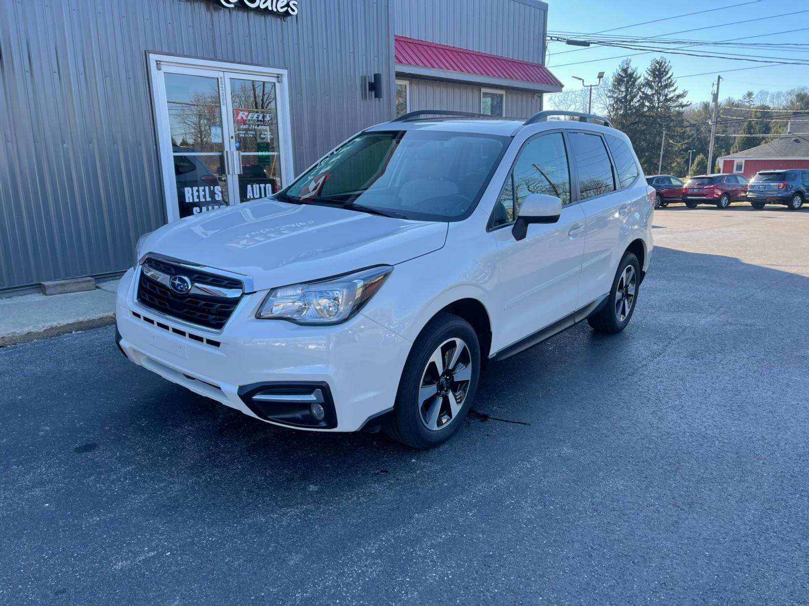 2018 White /Gray Subaru Forester 2.5i Premium PZEV CVT (JF2SJAGC0JH) with an 2.5L H4 SOHC 16V engine, Automatic transmission, located at 11115 Chardon Rd. , Chardon, OH, 44024, (440) 214-9705, 41.580246, -81.241943 - 2018 Subaru Forester ---- One Owner Carfax ---- 86K Miles ---- All Wheel Drive ----- 28 MPG Combined ---- Panoramic Moon Roof ---- Fully Serviced and Recently Detailed ---- Reel's Auto Sales is located in both Chardon and Orwell Ohio. Financing available and trades welcome. Please call or text to co - Photo #14