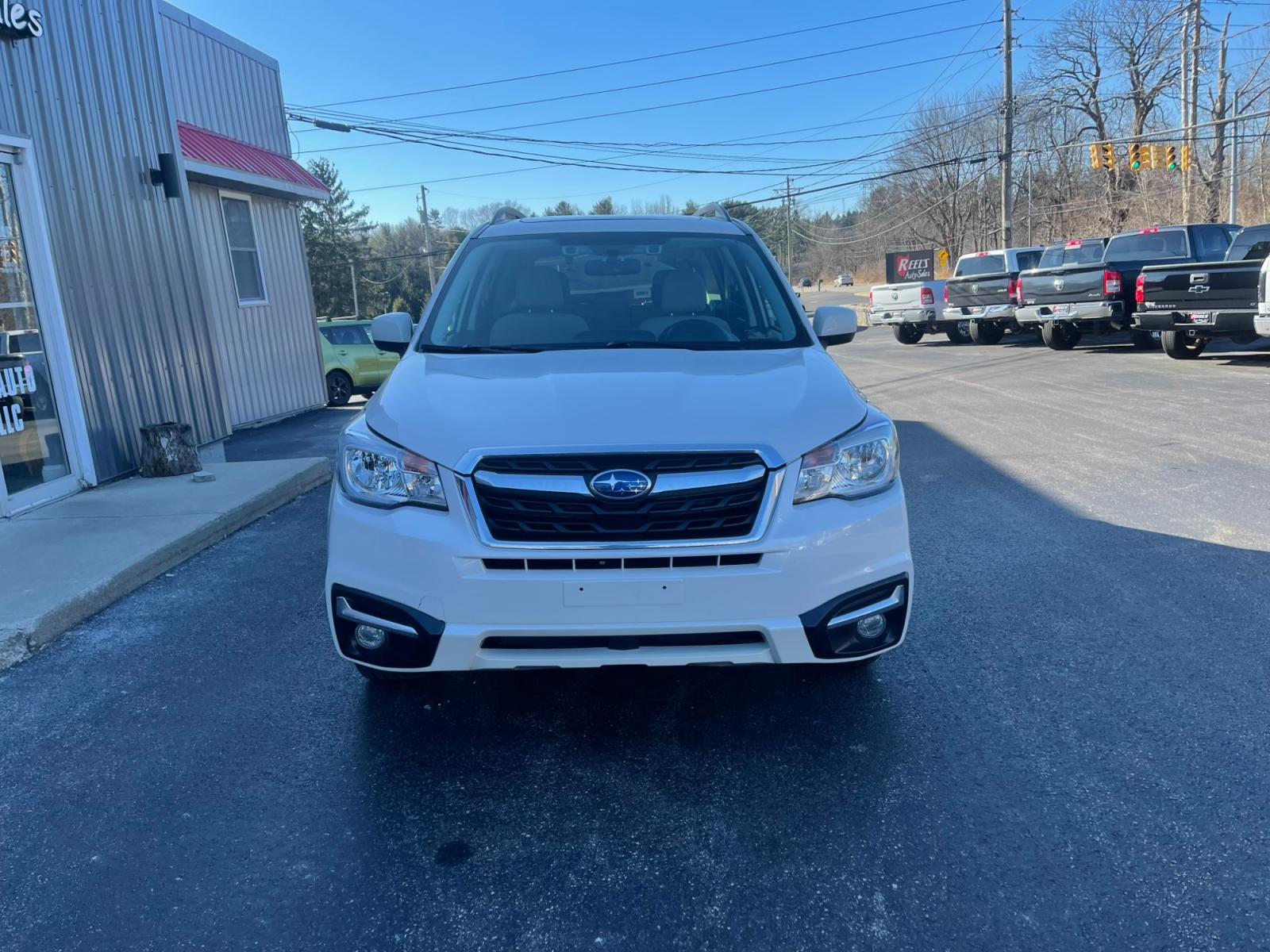 2018 White /Gray Subaru Forester 2.5i Premium PZEV CVT (JF2SJAGC0JH) with an 2.5L H4 SOHC 16V engine, Automatic transmission, located at 11115 Chardon Rd. , Chardon, OH, 44024, (440) 214-9705, 41.580246, -81.241943 - 2018 Subaru Forester ---- One Owner Carfax ---- 86K Miles ---- All Wheel Drive ----- 28 MPG Combined ---- Panoramic Moon Roof ---- Fully Serviced and Recently Detailed ---- Reel's Auto Sales is located in both Chardon and Orwell Ohio. Financing available and trades welcome. Please call or text to co - Photo #1