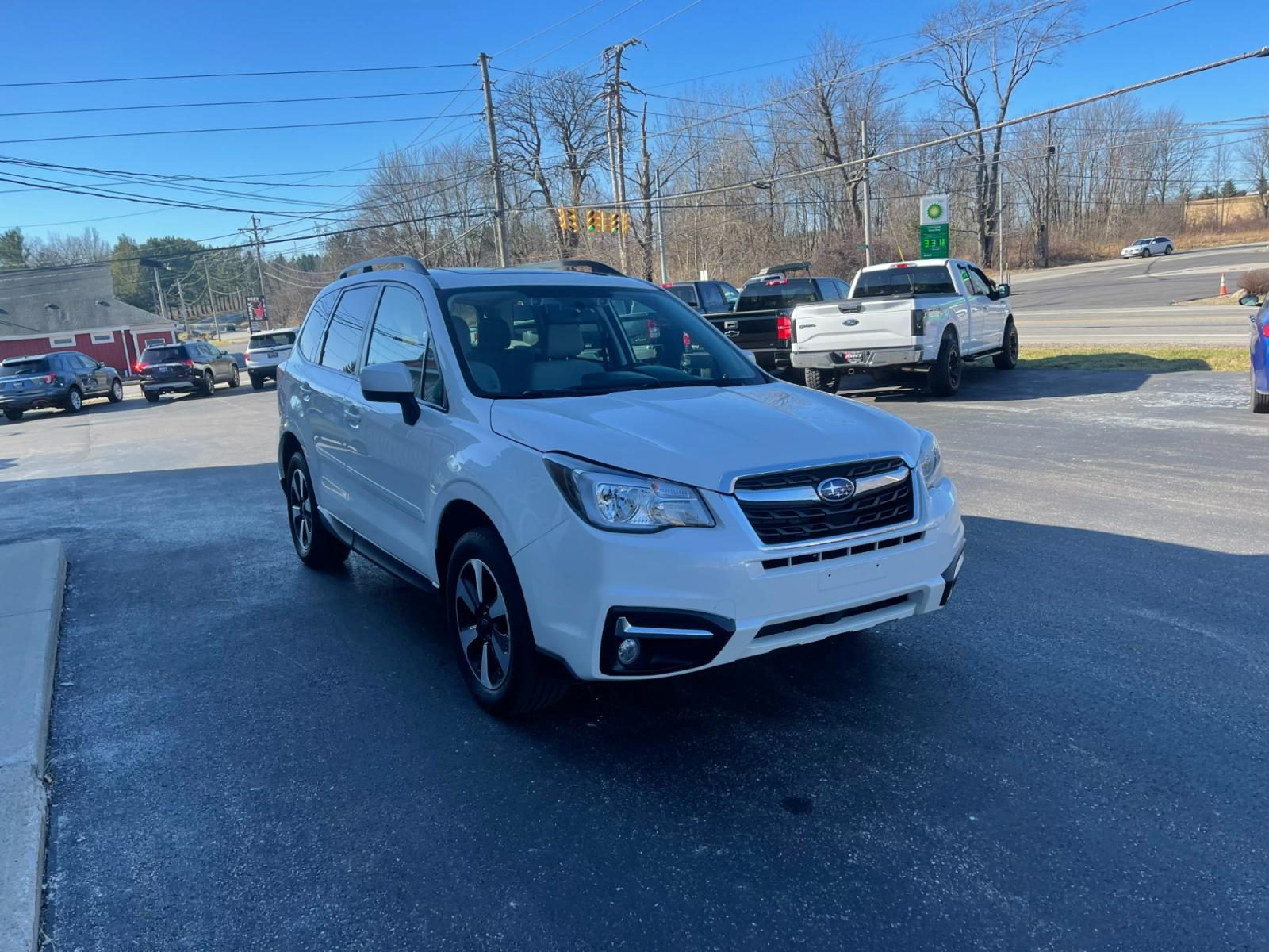 2018 White /Gray Subaru Forester 2.5i Premium PZEV CVT (JF2SJAGC0JH) with an 2.5L H4 SOHC 16V engine, Automatic transmission, located at 11115 Chardon Rd. , Chardon, OH, 44024, (440) 214-9705, 41.580246, -81.241943 - 2018 Subaru Forester ---- One Owner Carfax ---- 86K Miles ---- All Wheel Drive ----- 28 MPG Combined ---- Panoramic Moon Roof ---- Fully Serviced and Recently Detailed ---- Reel's Auto Sales is located in both Chardon and Orwell Ohio. Financing available and trades welcome. Please call or text to co - Photo #2