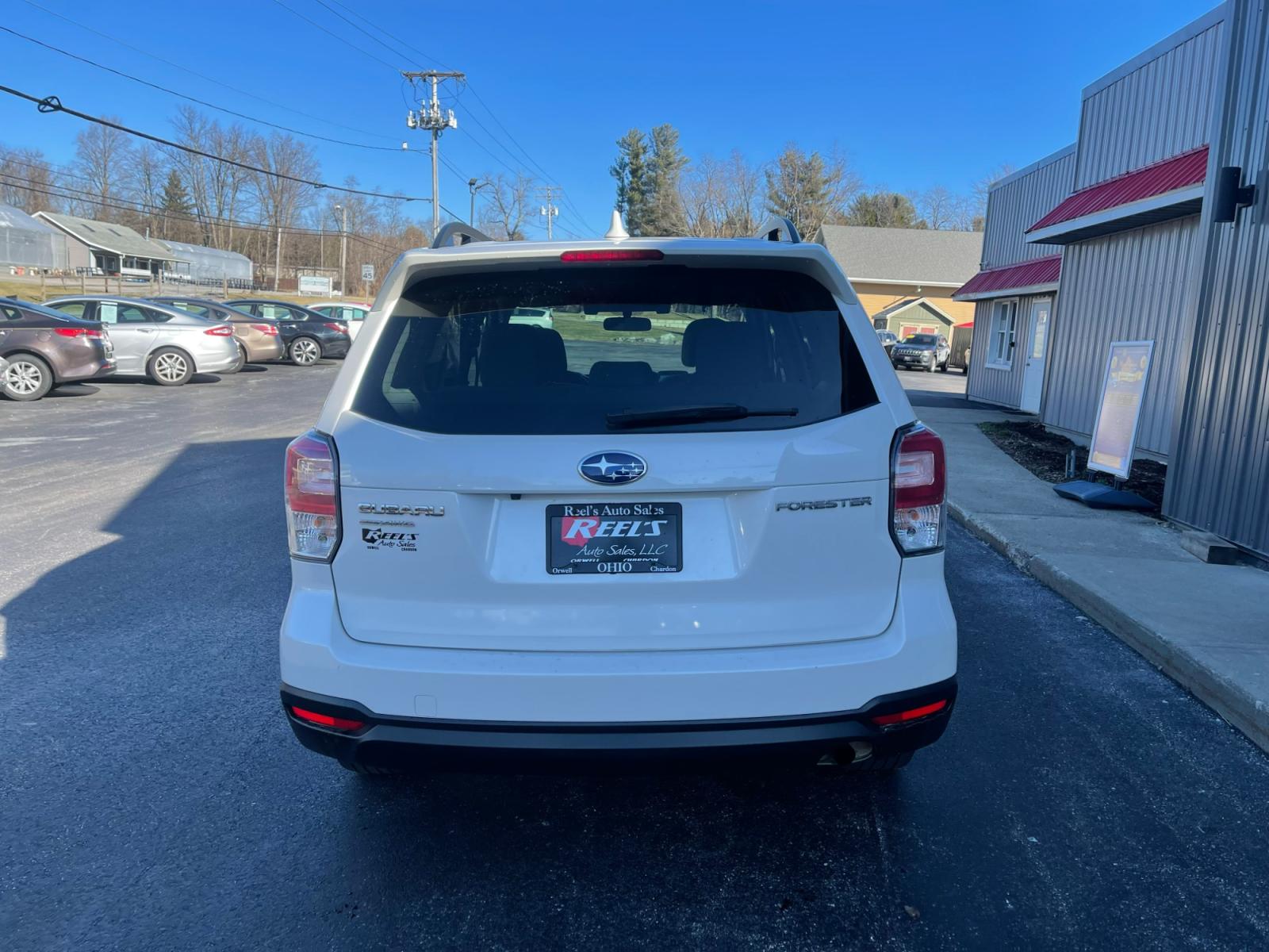2018 White /Gray Subaru Forester 2.5i Premium PZEV CVT (JF2SJAGC0JH) with an 2.5L H4 SOHC 16V engine, Automatic transmission, located at 11115 Chardon Rd. , Chardon, OH, 44024, (440) 214-9705, 41.580246, -81.241943 - 2018 Subaru Forester ---- One Owner Carfax ---- 86K Miles ---- All Wheel Drive ----- 28 MPG Combined ---- Panoramic Moon Roof ---- Fully Serviced and Recently Detailed ---- Reel's Auto Sales is located in both Chardon and Orwell Ohio. Financing available and trades welcome. Please call or text to co - Photo #8