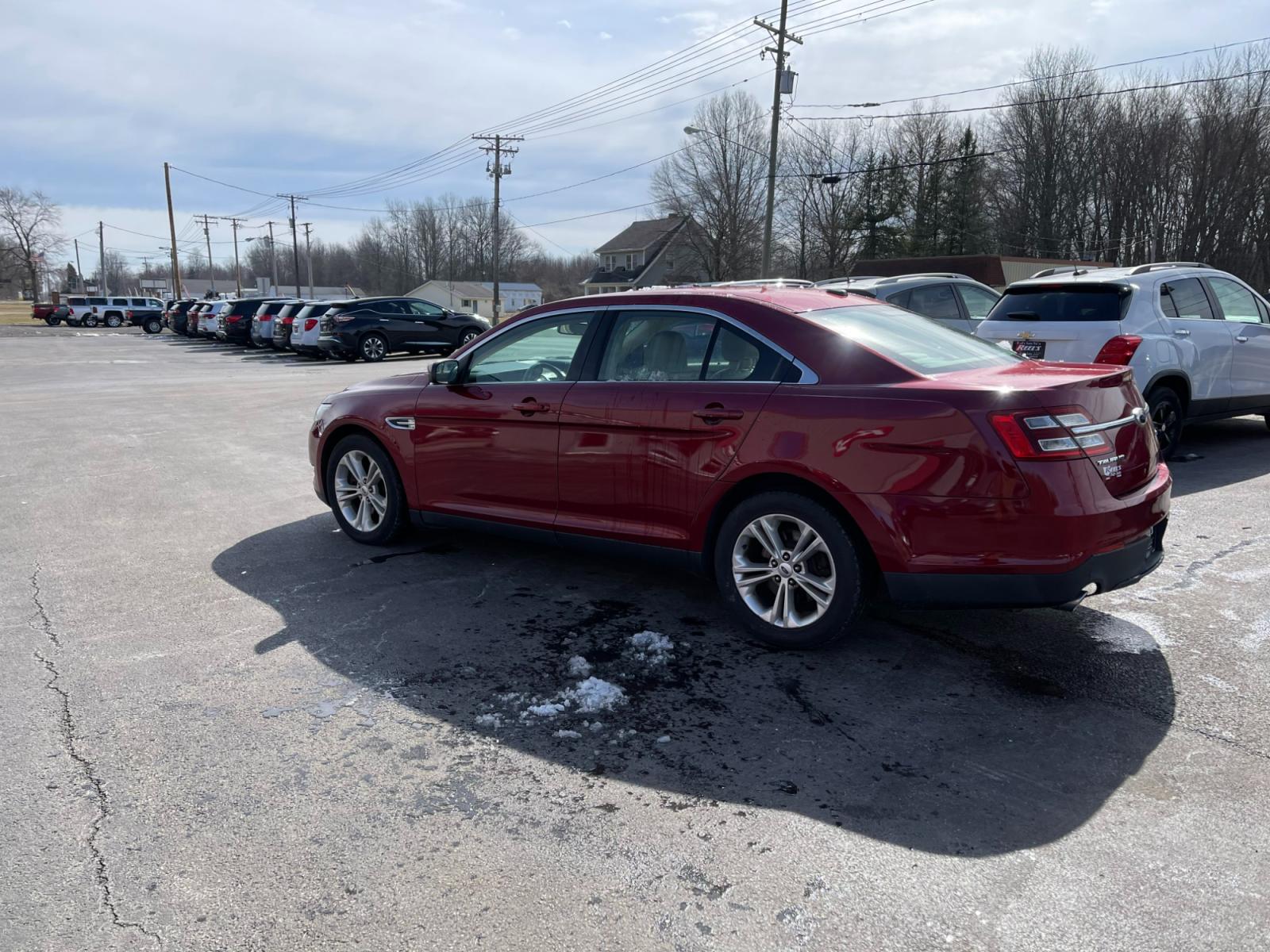 2013 Red /Tan Ford Taurus SEL FWD (1FAHP2E86DG) with an 3.5L V6 DOHC 24V engine, 6-Speed Automatic transmission, located at 547 E. Main St., Orwell, OH, 44076, (440) 437-5893, 41.535435, -80.847855 - Photo #12