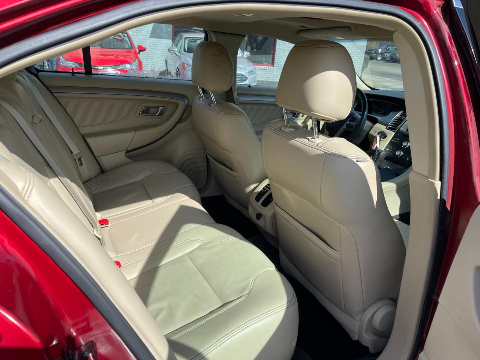 2013 Red /Tan Ford Taurus SEL FWD (1FAHP2E86DG) with an 3.5L V6 DOHC 24V engine, 6-Speed Automatic transmission, located at 547 E. Main St., Orwell, OH, 44076, (440) 437-5893, 41.535435, -80.847855 - Photo #43