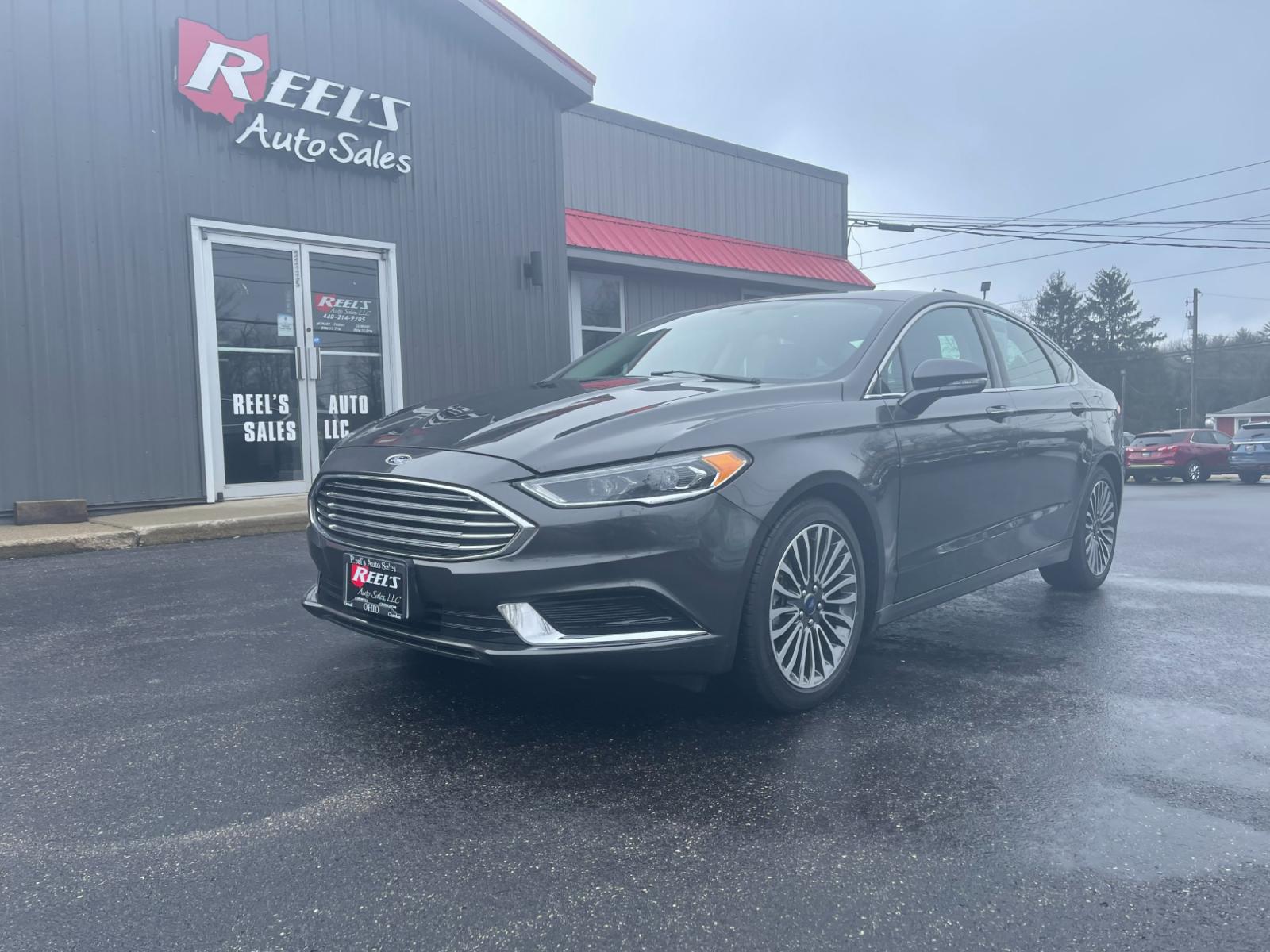 2018 Gray /Black Ford Fusion SE (3FA6P0HD6JR) with an 1.5L I4 DOHC 16V TURBO engine, 6A transmission, located at 11115 Chardon Rd. , Chardon, OH, 44024, (440) 214-9705, 41.580246, -81.241943 - 2018 Ford Fusion SE ---- One Owner Carfax ---- Only 19K Miles ---- Heated Leather Interior ---- 27 MPG Combined ---- Fully Serviced and Recently Detailed ---- Reel's Auto Sales is located in both Chardon and Orwell Ohio. Financing available and trades welcome. Please call or text to confirm location - Photo #1