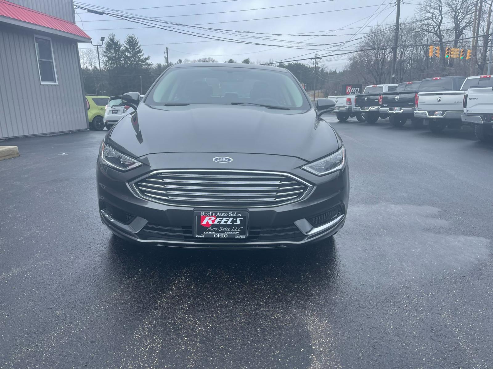 2018 Gray /Black Ford Fusion SE (3FA6P0HD6JR) with an 1.5L I4 DOHC 16V TURBO engine, 6A transmission, located at 11115 Chardon Rd. , Chardon, OH, 44024, (440) 214-9705, 41.580246, -81.241943 - 2018 Ford Fusion SE ---- One Owner Carfax ---- Only 19K Miles ---- Heated Leather Interior ---- 27 MPG Combined ---- Fully Serviced and Recently Detailed ---- Reel's Auto Sales is located in both Chardon and Orwell Ohio. Financing available and trades welcome. Please call or text to confirm location - Photo #2