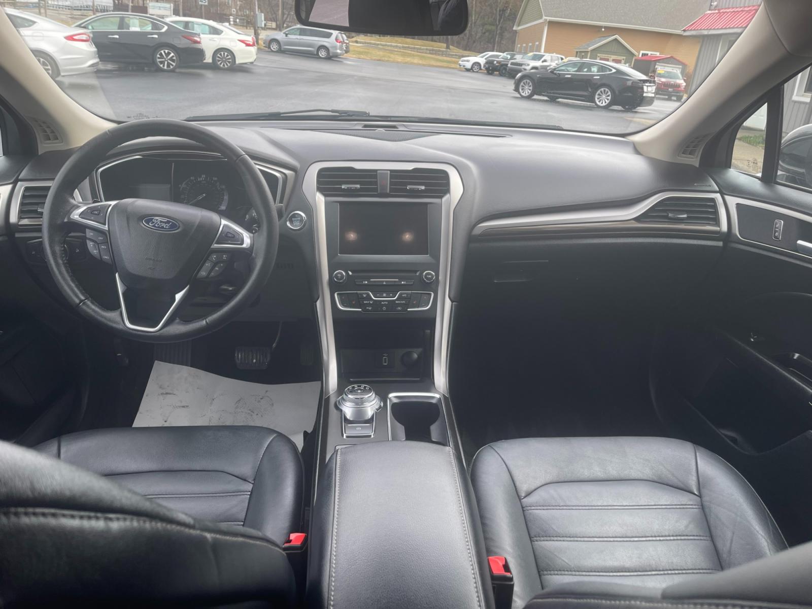 2018 Gray /Black Ford Fusion SE (3FA6P0HD6JR) with an 1.5L I4 DOHC 16V TURBO engine, 6A transmission, located at 11115 Chardon Rd. , Chardon, OH, 44024, (440) 214-9705, 41.580246, -81.241943 - 2018 Ford Fusion SE ---- One Owner Carfax ---- Only 19K Miles ---- Heated Leather Interior ---- 27 MPG Combined ---- Fully Serviced and Recently Detailed ---- Reel's Auto Sales is located in both Chardon and Orwell Ohio. Financing available and trades welcome. Please call or text to confirm location - Photo #47