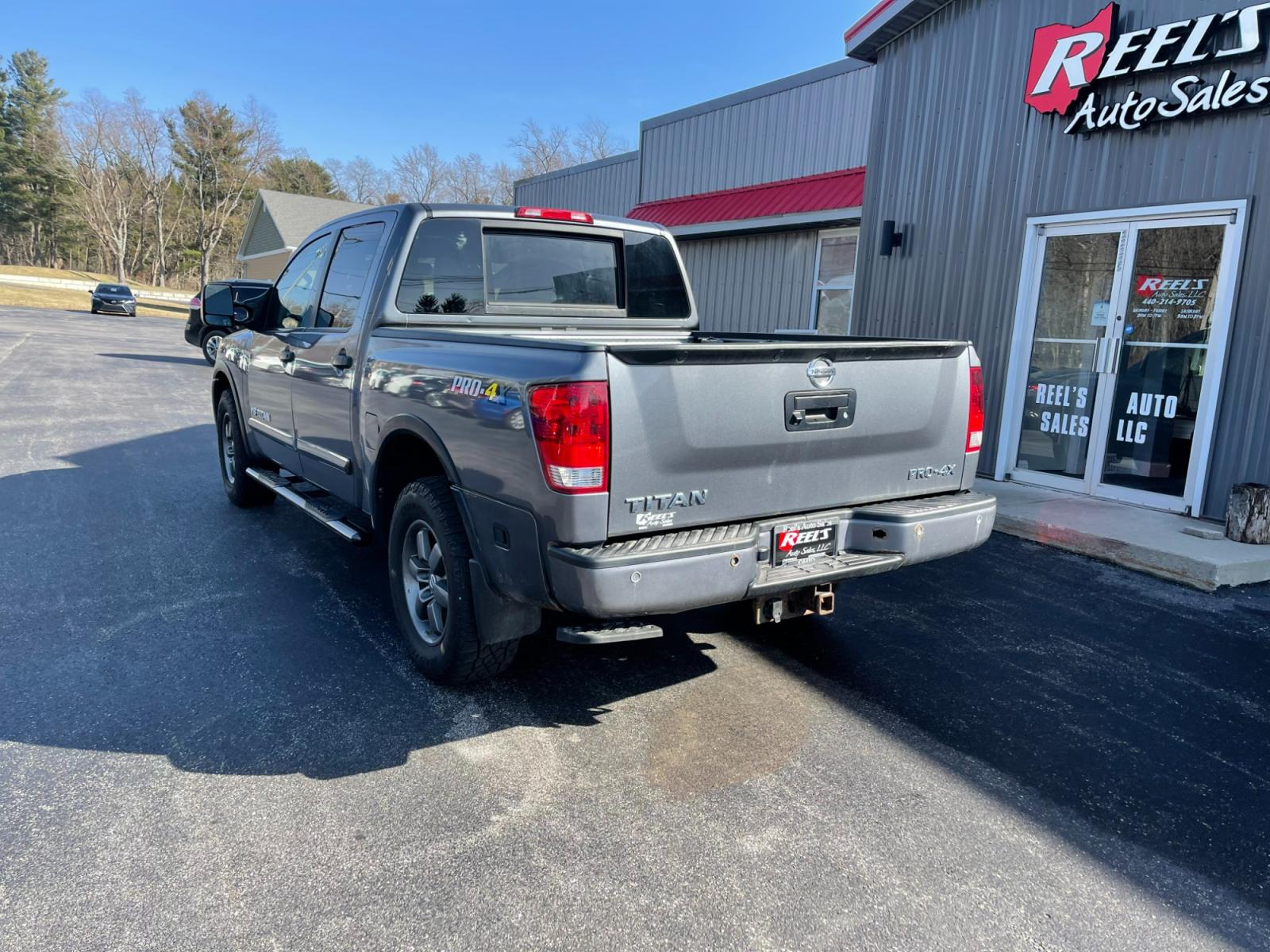 2013 Gray /Black Nissan Titan PRO-4X Crew Cab 4WD SWB (1N6AA0EC1DN) with an 5.6L V8 DOHC 32V engine, 5-Speed Automatic transmission, located at 547 E. Main St., Orwell, OH, 44076, (440) 437-5893, 41.535435, -80.847855 - 2013 Nissan Titan PRO-4X ---- Heated Leather Seats ---- Big Tow Package ---- 5.6L V8 ---- Fully Serviced and Recently Detailed ---- Reel's Auto Sales is located in both Chardon and Orwell Ohio. Financing available and trades welcome. Please call or text to confirm location, set an appointment or dis - Photo #10