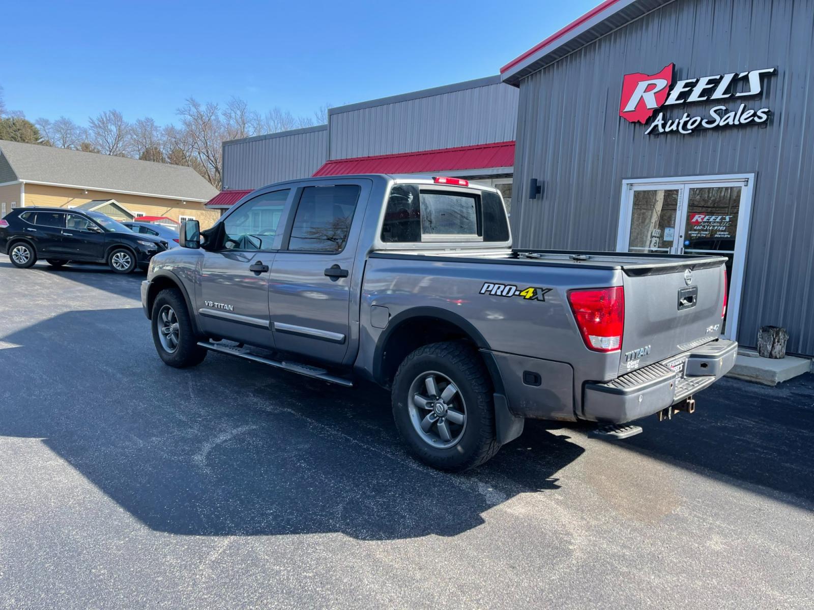 2013 Gray /Black Nissan Titan PRO-4X Crew Cab 4WD SWB (1N6AA0EC1DN) with an 5.6L V8 DOHC 32V engine, 5-Speed Automatic transmission, located at 547 E. Main St., Orwell, OH, 44076, (440) 437-5893, 41.535435, -80.847855 - 2013 Nissan Titan PRO-4X ---- Heated Leather Seats ---- Big Tow Package ---- 5.6L V8 ---- Fully Serviced and Recently Detailed ---- Reel's Auto Sales is located in both Chardon and Orwell Ohio. Financing available and trades welcome. Please call or text to confirm location, set an appointment or dis - Photo #11