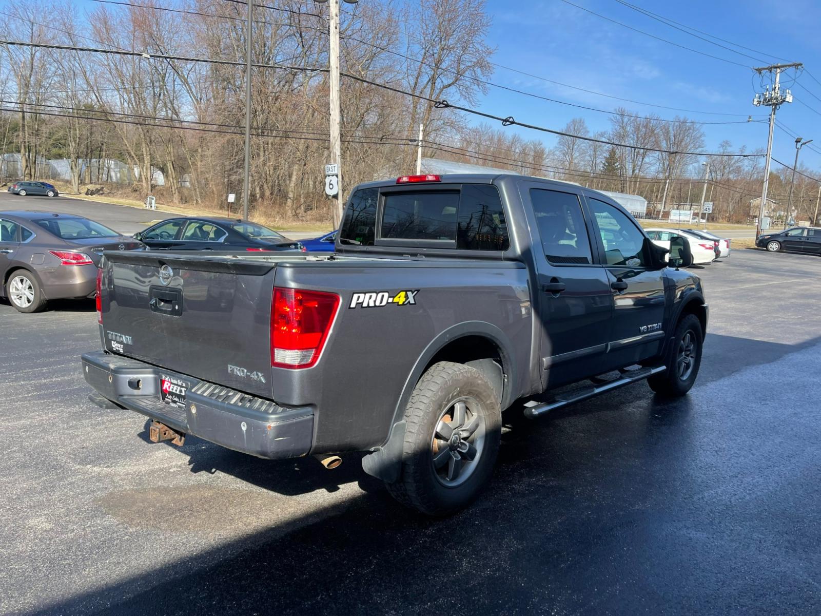 2013 Gray /Black Nissan Titan PRO-4X Crew Cab 4WD SWB (1N6AA0EC1DN) with an 5.6L V8 DOHC 32V engine, 5-Speed Automatic transmission, located at 547 E. Main St., Orwell, OH, 44076, (440) 437-5893, 41.535435, -80.847855 - 2013 Nissan Titan PRO-4X ---- Heated Leather Seats ---- Big Tow Package ---- 5.6L V8 ---- Fully Serviced and Recently Detailed ---- Reel's Auto Sales is located in both Chardon and Orwell Ohio. Financing available and trades welcome. Please call or text to confirm location, set an appointment or dis - Photo #7