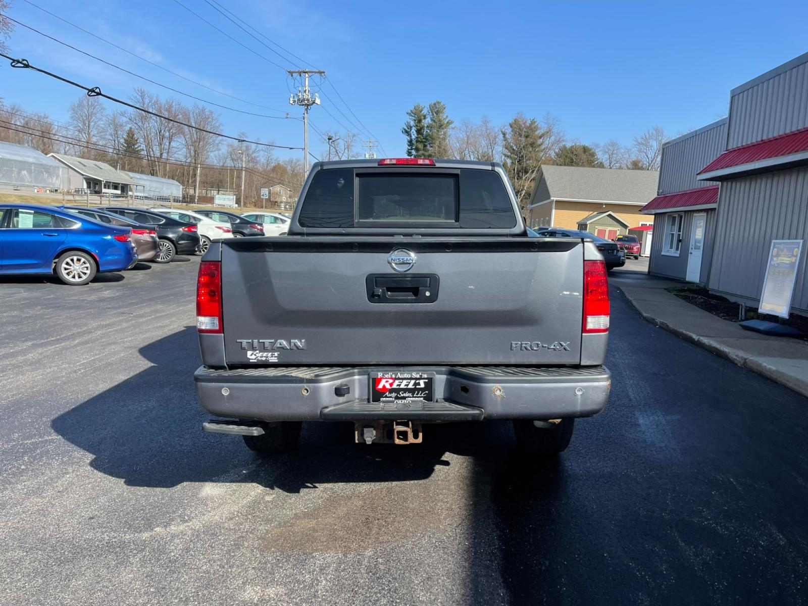 2013 Gray /Black Nissan Titan PRO-4X Crew Cab 4WD SWB (1N6AA0EC1DN) with an 5.6L V8 DOHC 32V engine, 5-Speed Automatic transmission, located at 547 E. Main St., Orwell, OH, 44076, (440) 437-5893, 41.535435, -80.847855 - 2013 Nissan Titan PRO-4X ---- Heated Leather Seats ---- Big Tow Package ---- 5.6L V8 ---- Fully Serviced and Recently Detailed ---- Reel's Auto Sales is located in both Chardon and Orwell Ohio. Financing available and trades welcome. Please call or text to confirm location, set an appointment or dis - Photo #8