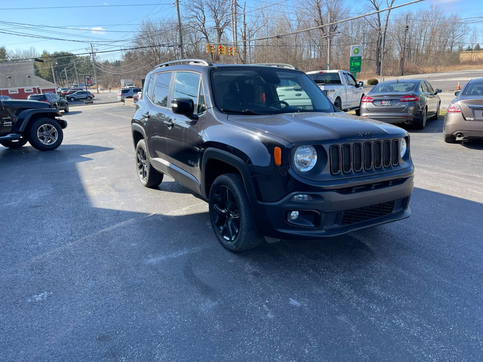2016 Black /Black Jeep Renegade Latitude 4WD (ZACCJBBT5GP) with an 2.4L I4 DOHC 16V engine, 9A transmission, located at 547 E. Main St., Orwell, OH, 44076, (440) 437-5893, 41.535435, -80.847855 - Photo #2