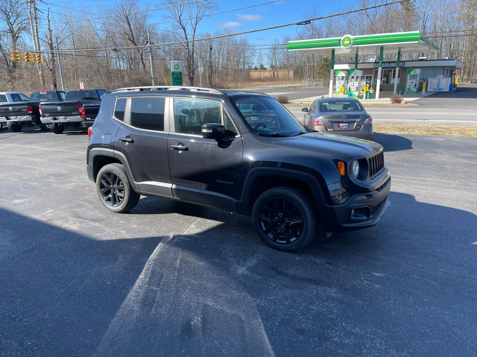 2016 Black /Black Jeep Renegade Latitude 4WD (ZACCJBBT5GP) with an 2.4L I4 DOHC 16V engine, 9A transmission, located at 547 E. Main St., Orwell, OH, 44076, (440) 437-5893, 41.535435, -80.847855 - Photo #3