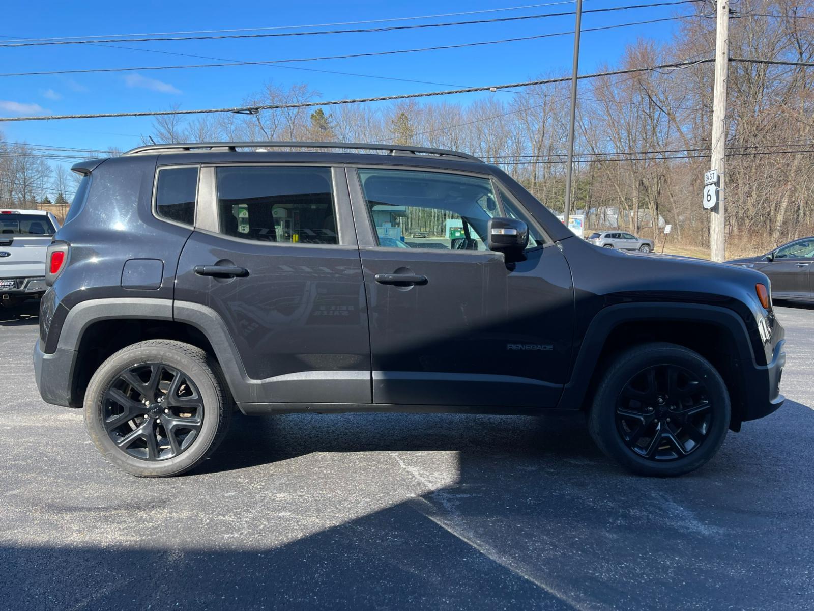 2016 Black /Black Jeep Renegade Latitude 4WD (ZACCJBBT5GP) with an 2.4L I4 DOHC 16V engine, 9A transmission, located at 547 E. Main St., Orwell, OH, 44076, (440) 437-5893, 41.535435, -80.847855 - 2016 Jeep Renegade ---- Batman v Superman Edition ---- Heated Seats ---- Heated Steering Wheel ---- All Wheel Drive ---- 24 MPG Combined ---- Fully Serviced and Recently Detailed ---- Reel's Auto Sales is located in both Chardon and Orwell Ohio. Financing available and trades welcome. Please call or - Photo #5