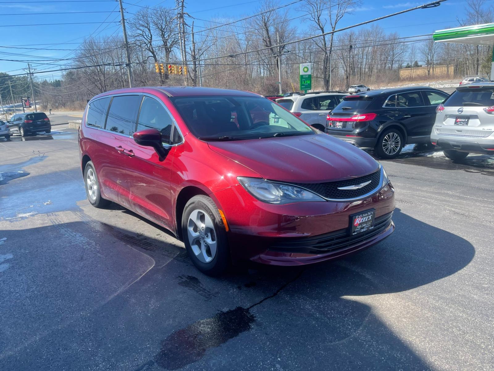 2017 Red /Black Chrysler Pacifica LX (2C4RC1CG6HR) with an 3.6L V6 DOHC 24V engine, 9A transmission, located at 11115 Chardon Rd. , Chardon, OH, 44024, (440) 214-9705, 41.580246, -81.241943 - 2017 Chrysler Pacifica LX ---- 8 Passenger Seating ---- Three Climate Zones ---- Fully Serviced and Recently Detailed ---- Reel's Auto Sales is located in both Chardon and Orwell Ohio. Financing available and trades welcome. Please call or text to confirm location, set an appointment or discuss fina - Photo #2
