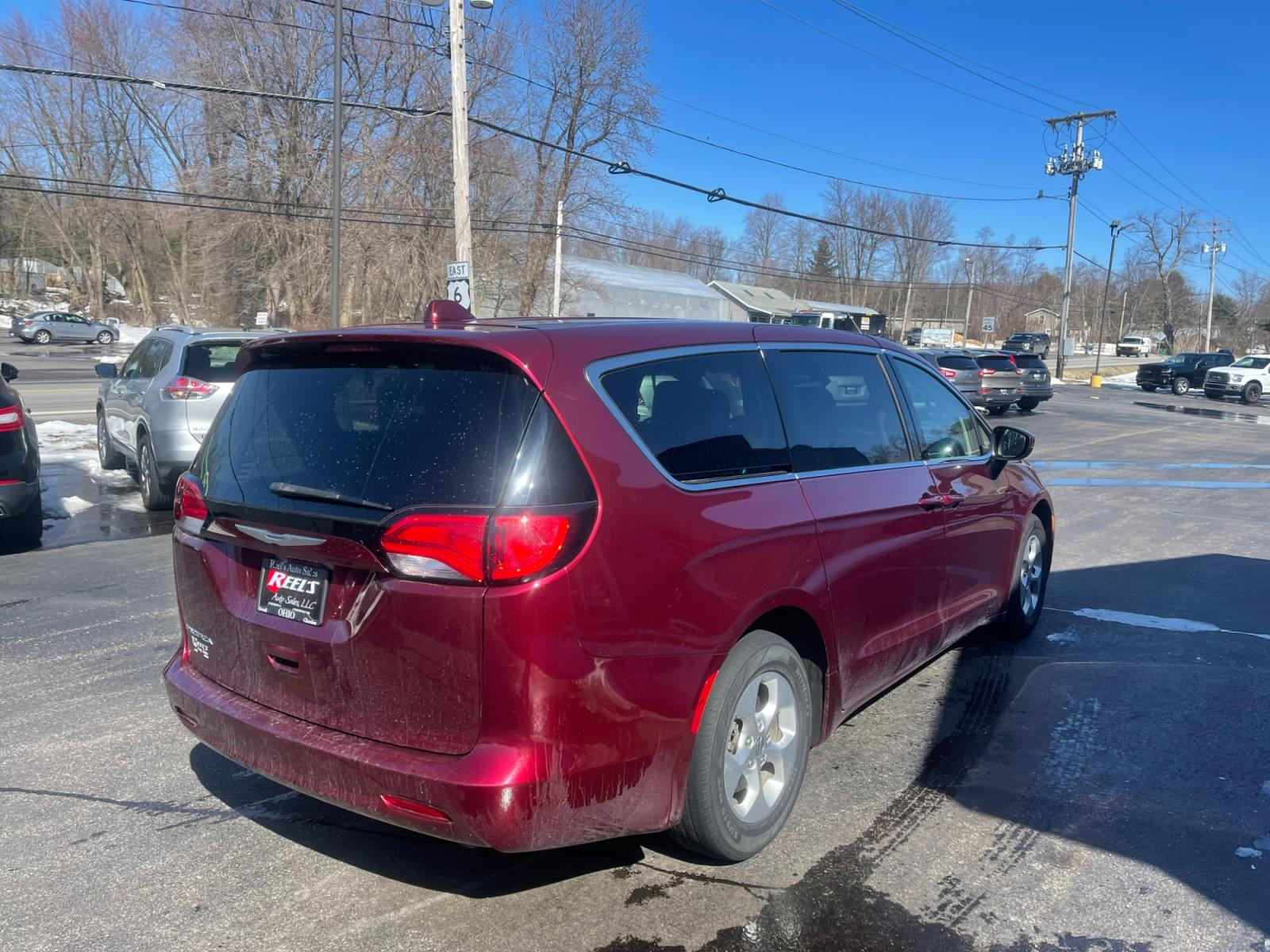 2017 Red /Black Chrysler Pacifica LX (2C4RC1CG6HR) with an 3.6L V6 DOHC 24V engine, 9A transmission, located at 11115 Chardon Rd. , Chardon, OH, 44024, (440) 214-9705, 41.580246, -81.241943 - 2017 Chrysler Pacifica LX ---- 8 Passenger Seating ---- Three Climate Zones ---- Fully Serviced and Recently Detailed ---- Reel's Auto Sales is located in both Chardon and Orwell Ohio. Financing available and trades welcome. Please call or text to confirm location, set an appointment or discuss fina - Photo #7