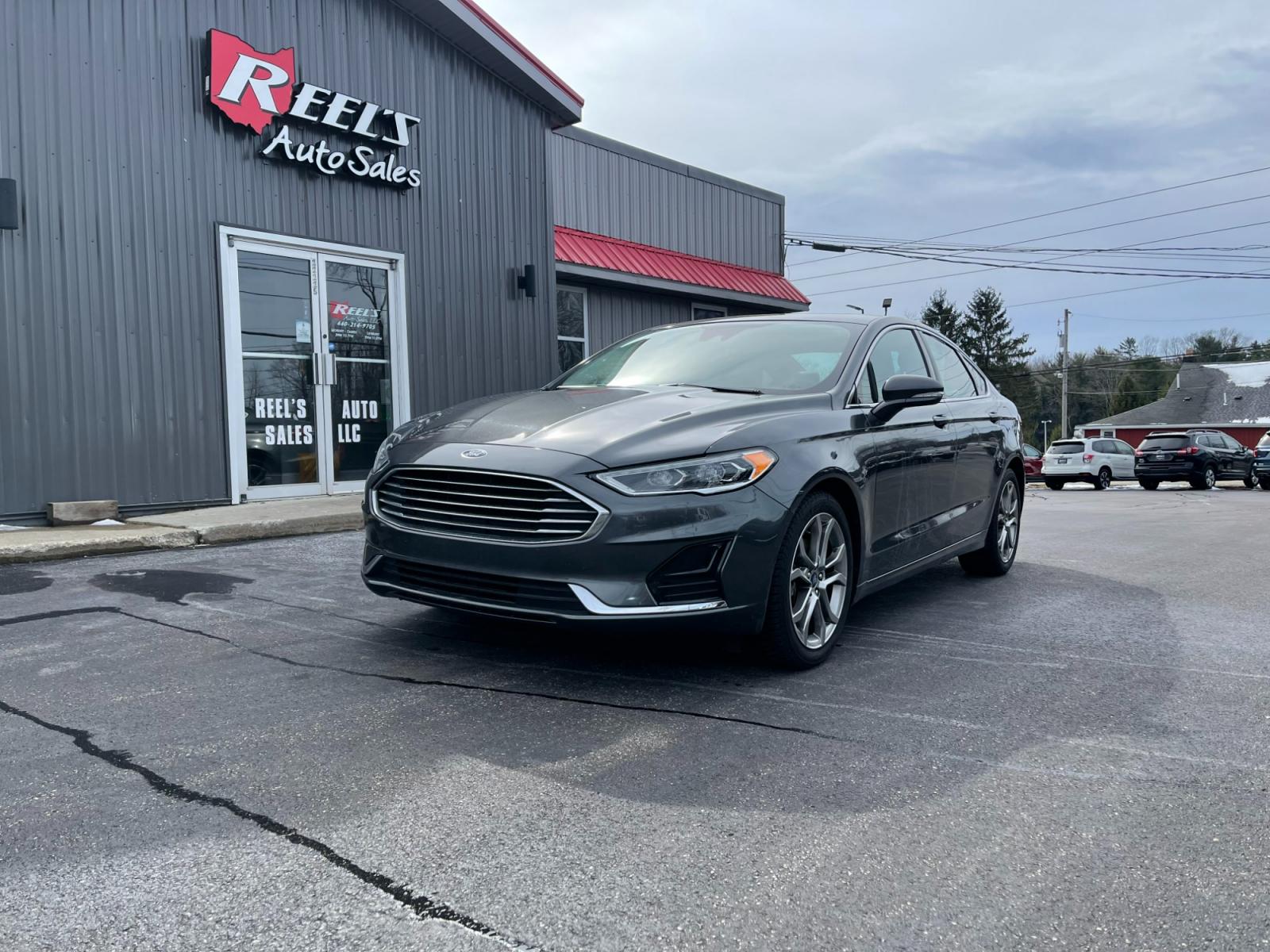 2019 Gray /Black Ford Fusion SEL (3FA6P0CD5KR) with an 1.5L I4 DOHC 16V TURBO engine, 6A transmission, located at 11115 Chardon Rd. , Chardon, OH, 44024, (440) 214-9705, 41.580246, -81.241943 - Photo #0