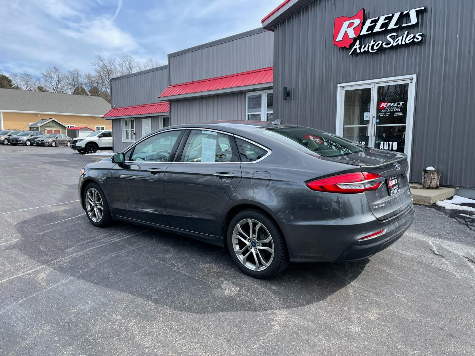 2019 Gray /Black Ford Fusion SEL (3FA6P0CD5KR) with an 1.5L I4 DOHC 16V TURBO engine, 6A transmission, located at 11115 Chardon Rd. , Chardon, OH, 44024, (440) 214-9705, 41.580246, -81.241943 - Photo #10