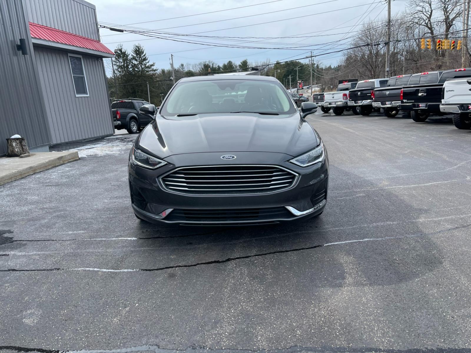 2019 Gray /Black Ford Fusion SEL (3FA6P0CD5KR) with an 1.5L I4 DOHC 16V TURBO engine, 6A transmission, located at 11115 Chardon Rd. , Chardon, OH, 44024, (440) 214-9705, 41.580246, -81.241943 - Photo #1