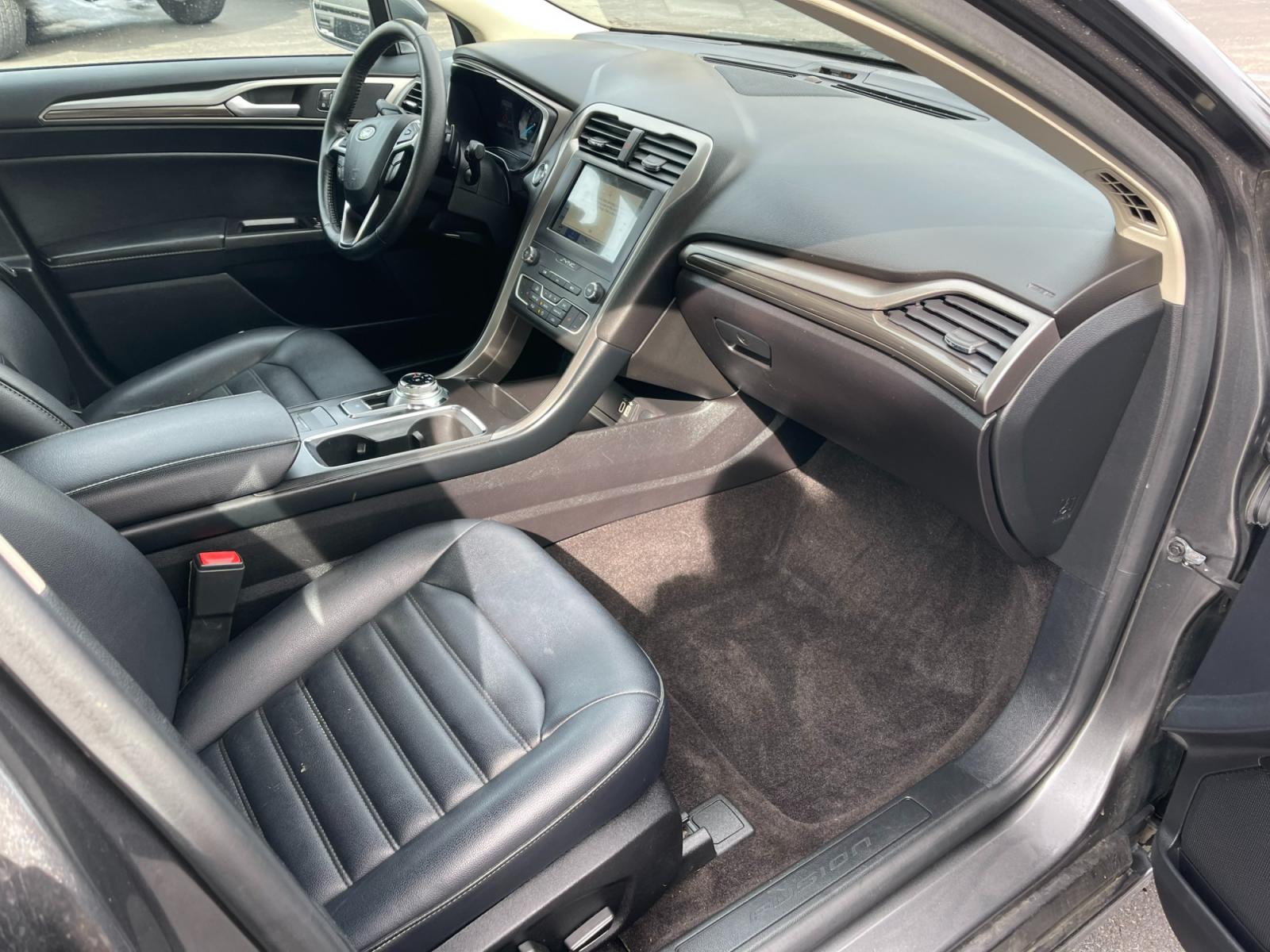 2019 Gray /Black Ford Fusion SEL (3FA6P0CD5KR) with an 1.5L I4 DOHC 16V TURBO engine, 6A transmission, located at 11115 Chardon Rd. , Chardon, OH, 44024, (440) 214-9705, 41.580246, -81.241943 - Photo #52