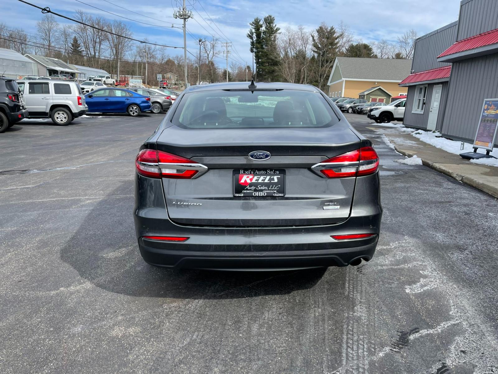 2019 Gray /Black Ford Fusion SEL (3FA6P0CD5KR) with an 1.5L I4 DOHC 16V TURBO engine, 6A transmission, located at 11115 Chardon Rd. , Chardon, OH, 44024, (440) 214-9705, 41.580246, -81.241943 - Photo #8