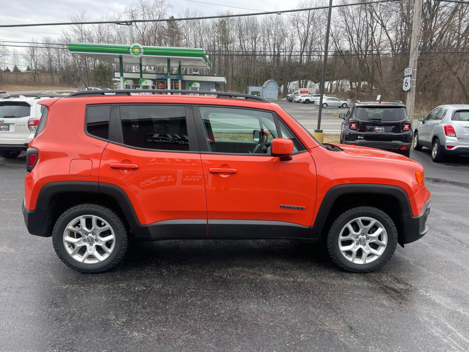 2017 Orange /Black Jeep Renegade Latitude 4WD (ZACCJBBB6HP) with an 2.4L I4 DOHC 16V engine, 9A transmission, located at 11115 Chardon Rd. , Chardon, OH, 44024, (440) 214-9705, 41.580246, -81.241943 - 2017 Jeep Renegade Latitude 4WD ---- Only 76K Miles ---- Push Button Start ---- 24 MPG Combined ---- Classic Jeep Looks With Great Fuel Economy ---- Fully Serviced and Recently Detailed ---- Reel's Auto Sales is located in both Chardon and Orwell Ohio. Financing available and trades welcome. Please - Photo #5