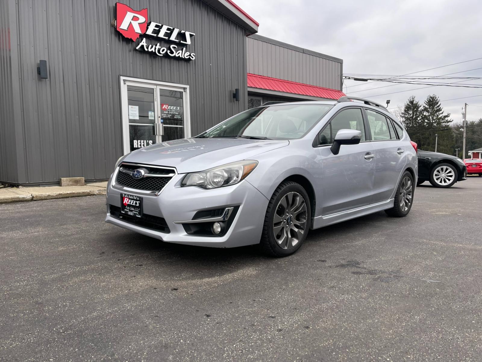 2015 Silver /Black Subaru Impreza 2.0i Sport Premium PZEV CVT 5-Door (JF1GPAT69F8) with an 2.0L H4 DOHC 16V engine, Automatic transmission, located at 11115 Chardon Rd. , Chardon, OH, 44024, (440) 214-9705, 41.580246, -81.241943 - 2015 Subaru Impreza 2.0i Sport Premium ---- 95K Miles ---- All Wheel Drive ---- 31 MPG Combined ---- Prefect Fuel Efficient And All Weather Car ---- Fully Serviced and Recently Detailed ---- Reel's Auto Sales is located in both Chardon and Orwell Ohio. Financing available and trades welcome. Please - Photo #0