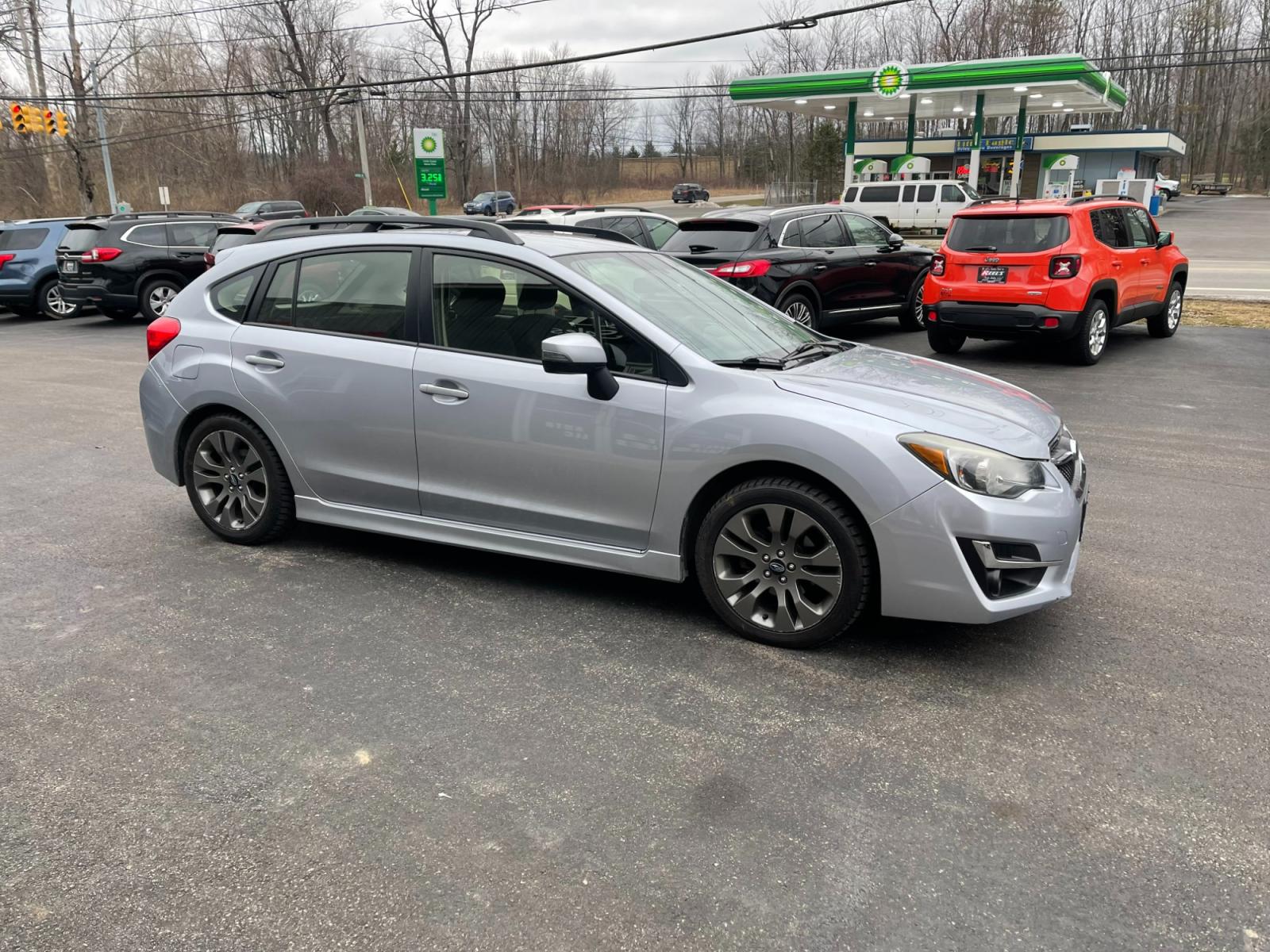 2015 Silver /Black Subaru Impreza 2.0i Sport Premium PZEV CVT 5-Door (JF1GPAT69F8) with an 2.0L H4 DOHC 16V engine, Automatic transmission, located at 11115 Chardon Rd. , Chardon, OH, 44024, (440) 214-9705, 41.580246, -81.241943 - 2015 Subaru Impreza 2.0i Sport Premium ---- 95K Miles ---- All Wheel Drive ---- 31 MPG Combined ---- Prefect Fuel Efficient And All Weather Car ---- Fully Serviced and Recently Detailed ---- Reel's Auto Sales is located in both Chardon and Orwell Ohio. Financing available and trades welcome. Please - Photo #3