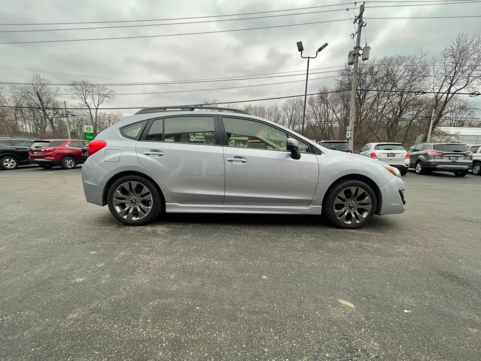 2015 Silver /Black Subaru Impreza 2.0i Sport Premium PZEV CVT 5-Door (JF1GPAT69F8) with an 2.0L H4 DOHC 16V engine, Automatic transmission, located at 11115 Chardon Rd. , Chardon, OH, 44024, (440) 214-9705, 41.580246, -81.241943 - 2015 Subaru Impreza 2.0i Sport Premium ---- 95K Miles ---- All Wheel Drive ---- 31 MPG Combined ---- Prefect Fuel Efficient And All Weather Car ---- Fully Serviced and Recently Detailed ---- Reel's Auto Sales is located in both Chardon and Orwell Ohio. Financing available and trades welcome. Please - Photo #5