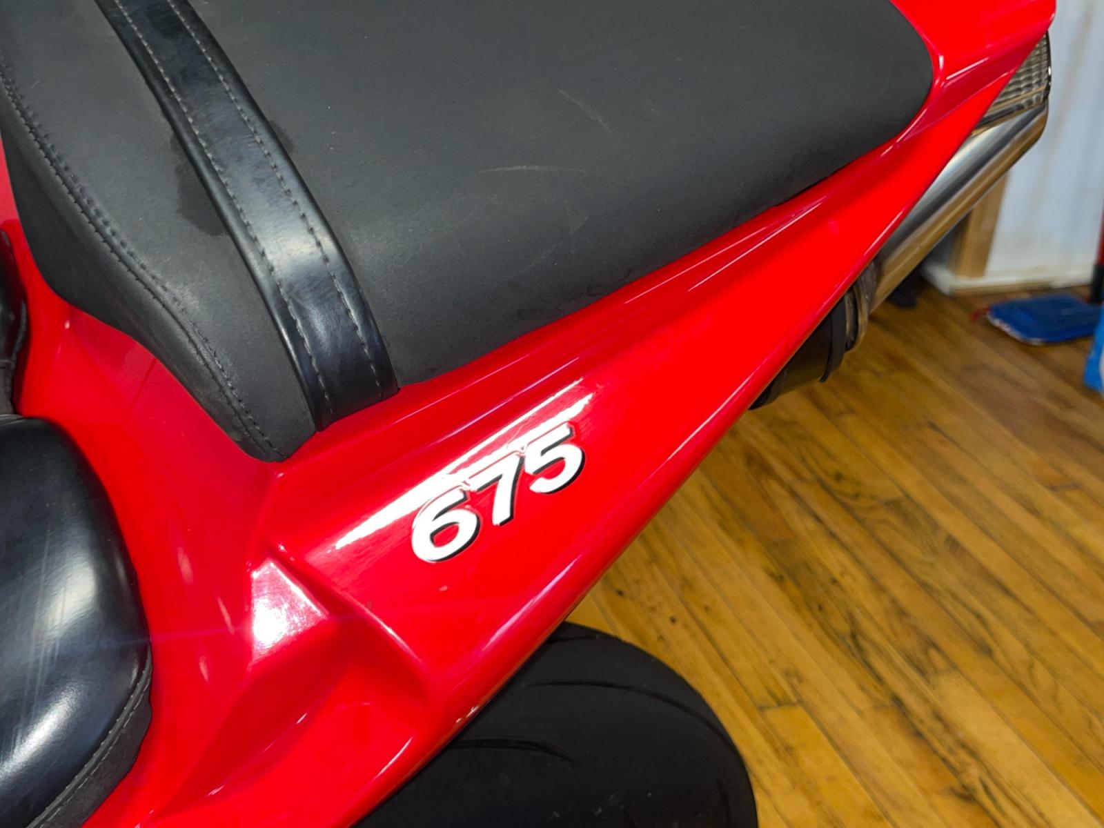 2007 Red Triumph Daytona 675 - (SMTD00NS57J) with an 675cc engine, 6-Speed Manual transmission, located at 11115 Chardon Rd. , Chardon, OH, 44024, (440) 214-9705, 41.580246, -81.241943 - Photo #7