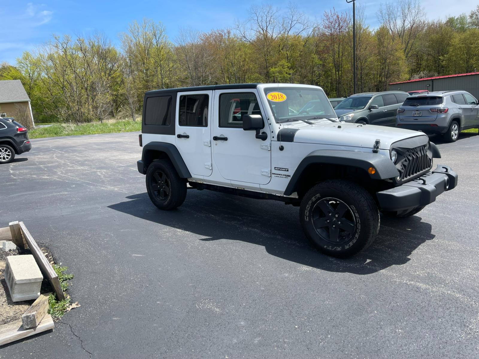 2018 White /Black Jeep Wrangler Unlimited Sport 4WD (1C4BJWDGXJL) with an 3.6L V6 DOHC 24V FFV engine, 5 Speed Auto transmission, located at 547 E. Main St., Orwell, OH, 44076, (440) 437-5893, 41.535435, -80.847855 - 2018 Jeep Wrangler Unlimited Sport ---- Automatic ---- LED Lights ---- Fully Serviced and Recently Detailed ---- Reel's Auto Sales is located in both Chardon and Orwell Ohio. Financing available and trades welcome. Please call or text to confirm location, set an appointment or discuss financing or t - Photo #3