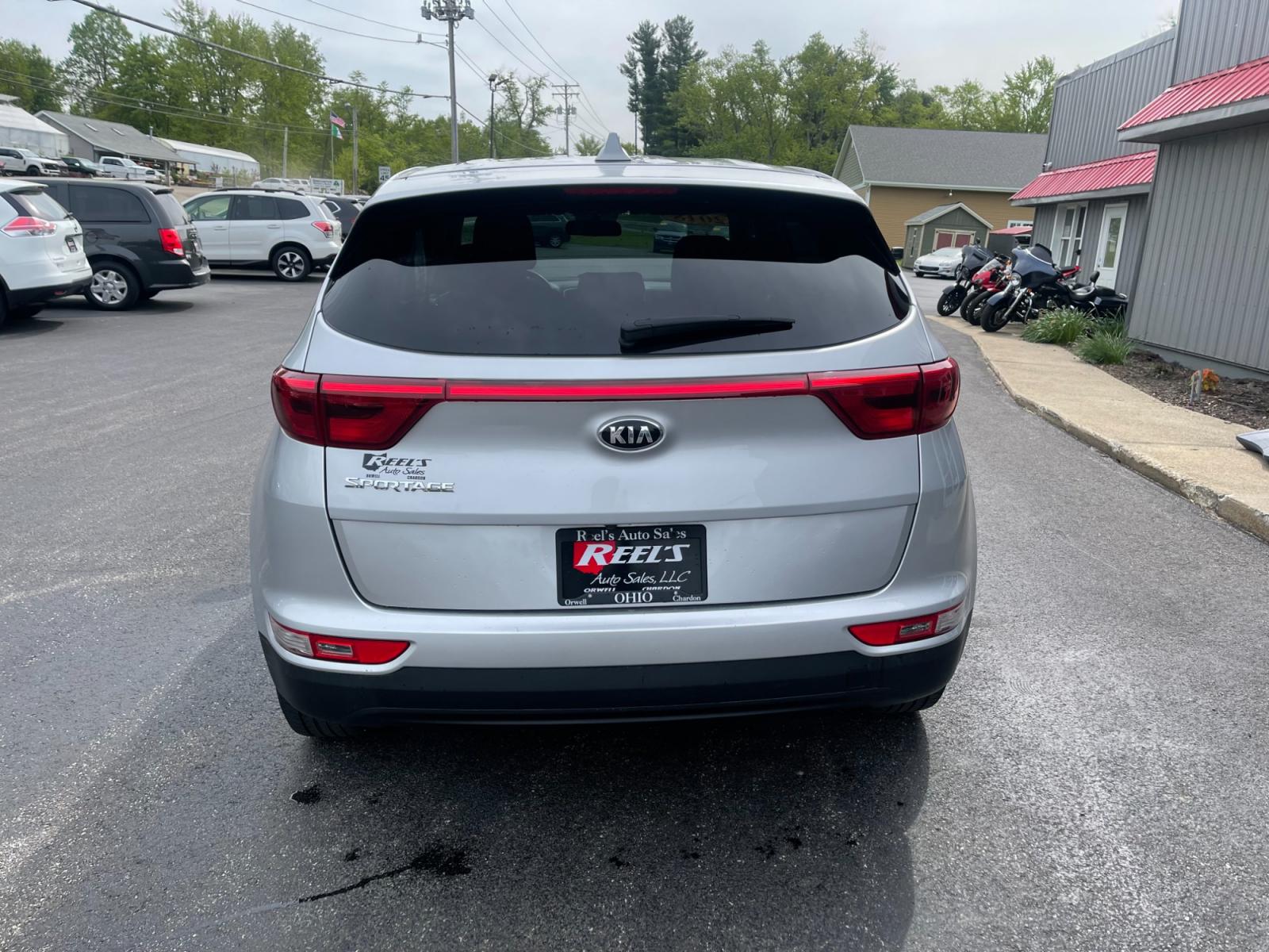 2018 Silver /Black Kia Sportage LX AWD (KNDPMCAC8J7) with an 2.4L I4 DOHC 24V engine, 6A transmission, located at 547 E. Main St., Orwell, OH, 44076, (440) 437-5893, 41.535435, -80.847855 - 2018 Kia Sportage LX AWD ---- Only 64K Miles ---- Heated Seats ---- 23 MPG Combined ---- Fully Serviced and Recently Detailed ---- Reel's Auto Sales is located in both Chardon and Orwell Ohio. Financing available and trades welcome. Please call or text to confirm location, set an appointment or disc - Photo #9